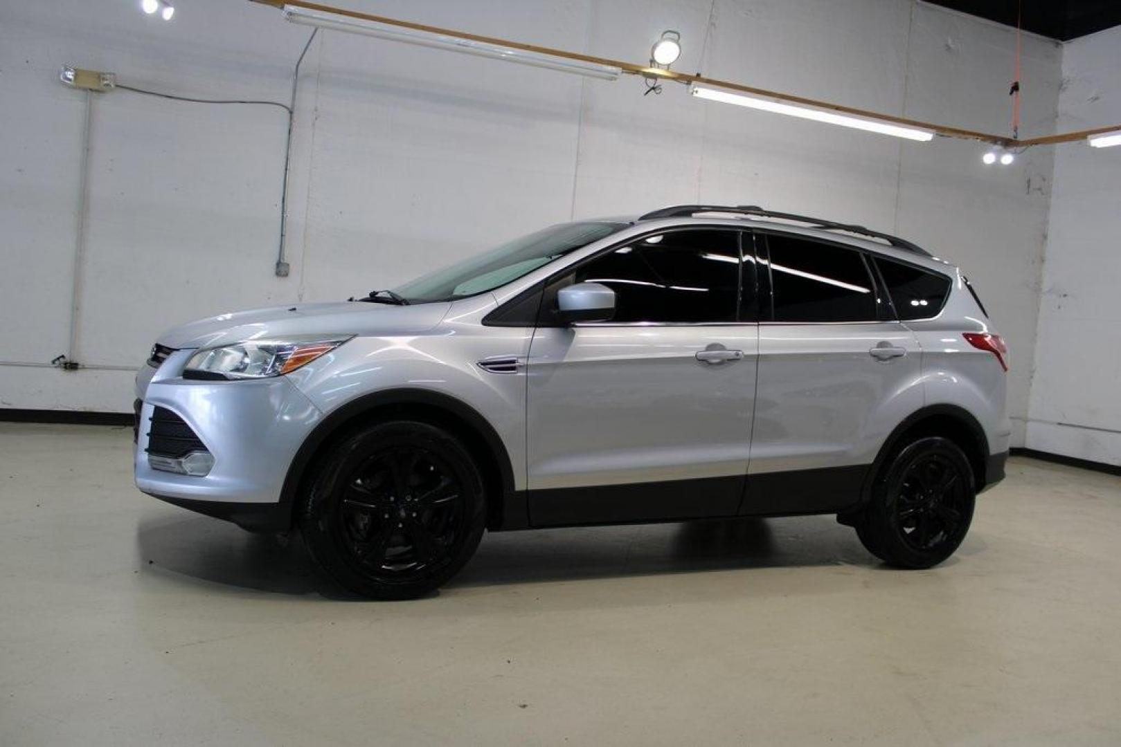 2014 Ingot Silver /Black Ford Escape SE (1FMCU0GX0EU) with an EcoBoost 1.6L I4 GTDi DOHC Turbocharged VCT engine, Automatic transmission, located at 15300 Midway Rd., Addison, TX, 75001, (972) 702-0011, 32.958321, -96.838074 - Photo#4