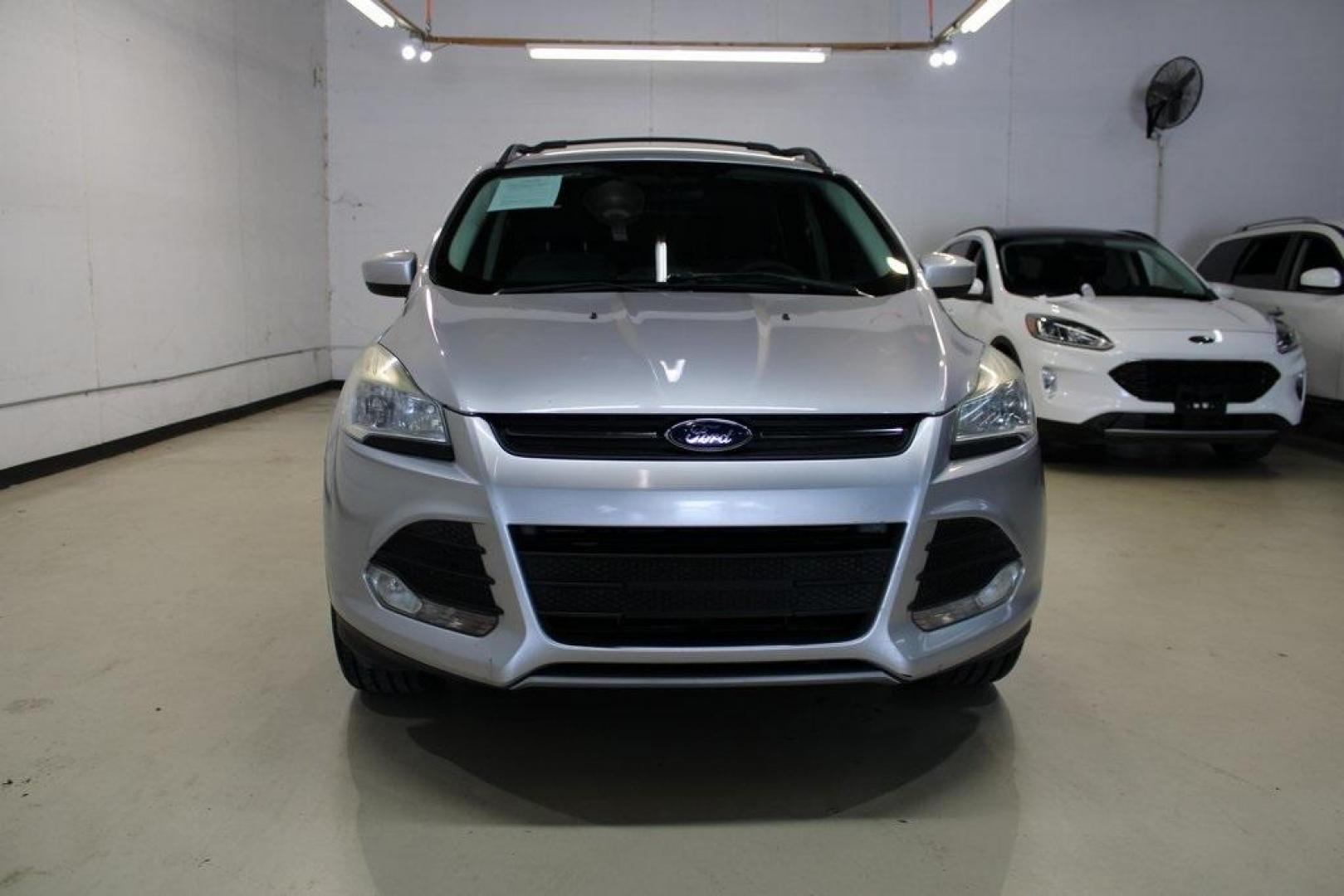 2014 Ingot Silver /Black Ford Escape SE (1FMCU0GX0EU) with an EcoBoost 1.6L I4 GTDi DOHC Turbocharged VCT engine, Automatic transmission, located at 15300 Midway Rd., Addison, TX, 75001, (972) 702-0011, 32.958321, -96.838074 - Photo#5