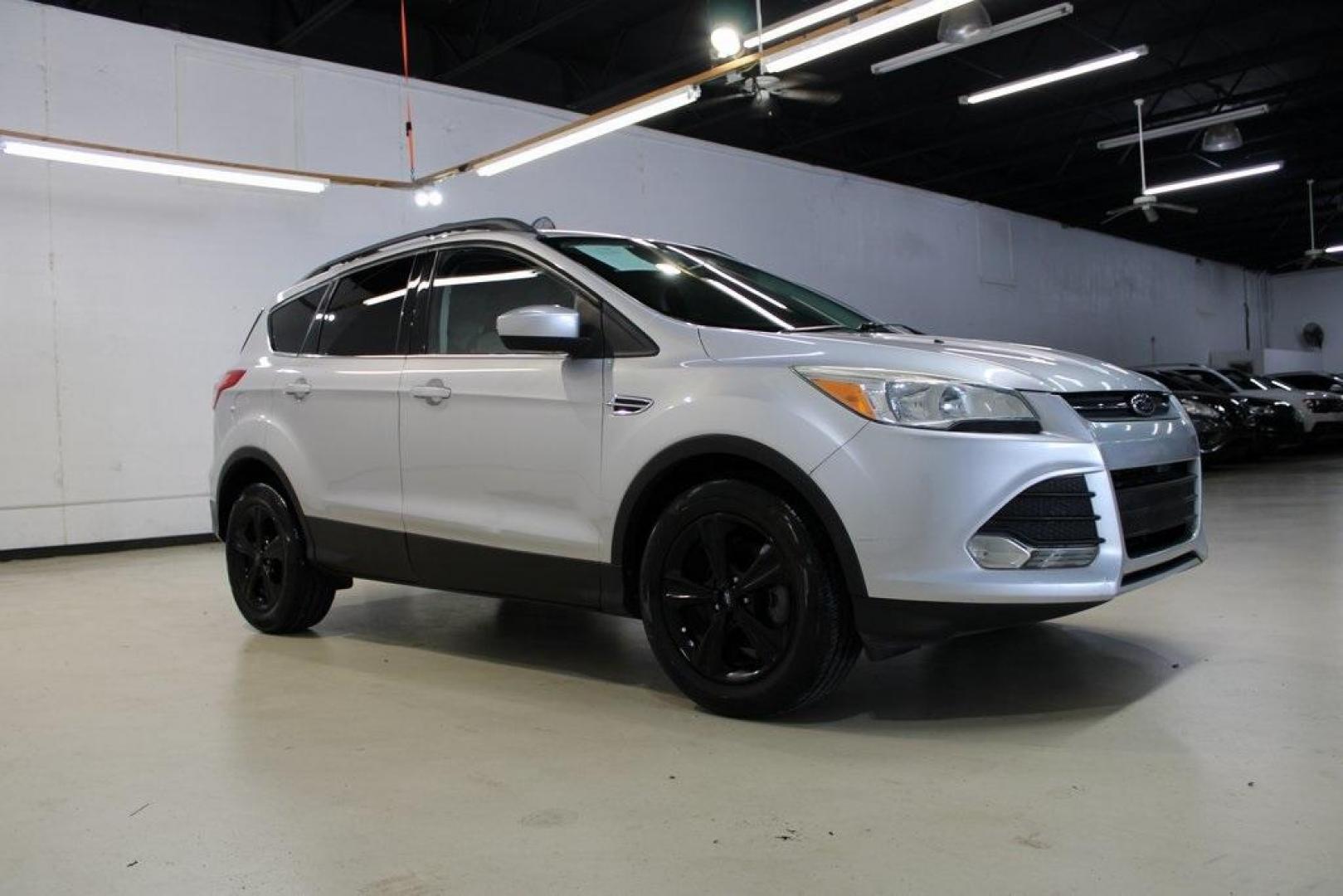 2014 Ingot Silver /Black Ford Escape SE (1FMCU0GX0EU) with an EcoBoost 1.6L I4 GTDi DOHC Turbocharged VCT engine, Automatic transmission, located at 15300 Midway Rd., Addison, TX, 75001, (972) 702-0011, 32.958321, -96.838074 - Photo#6