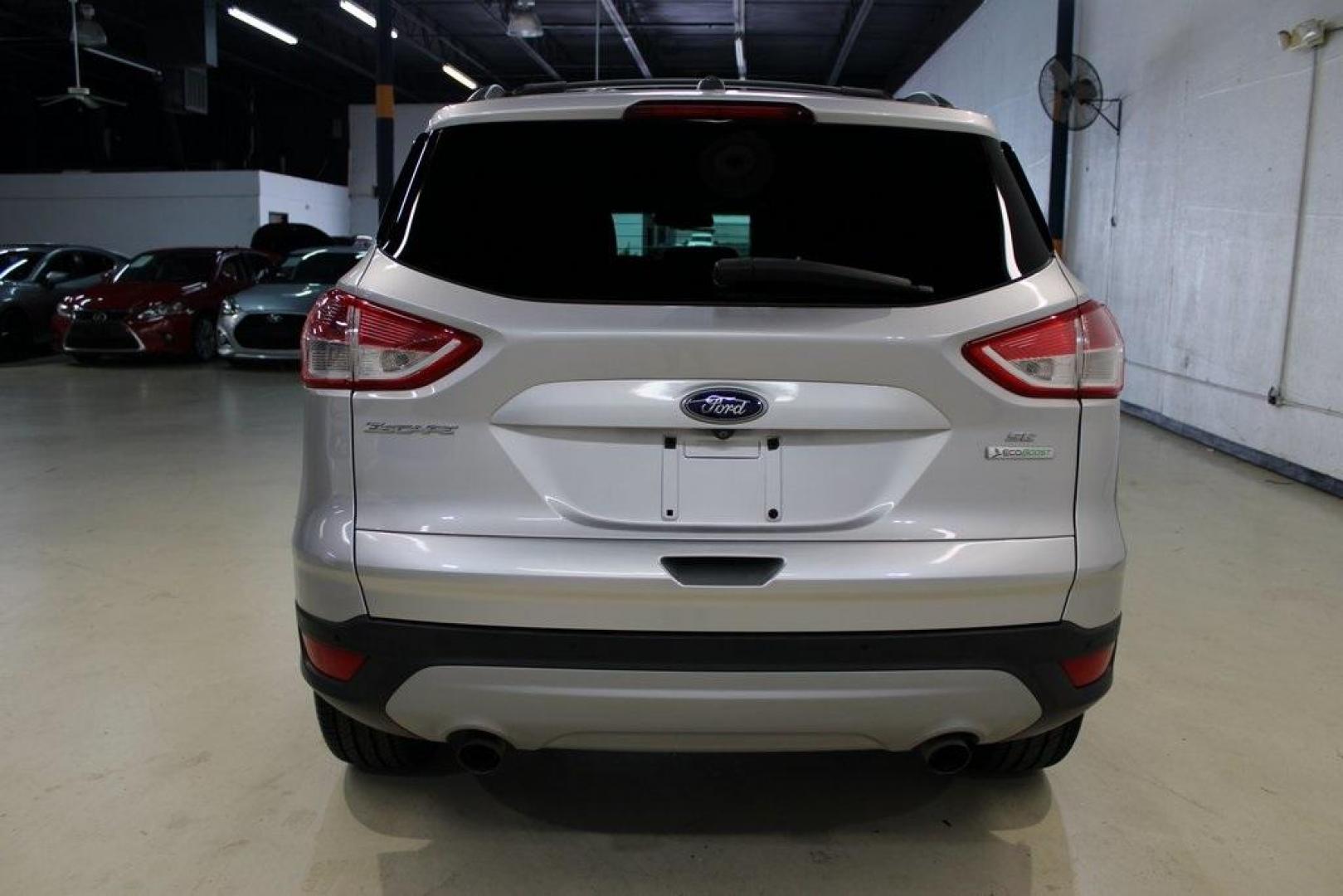 2014 Ingot Silver /Black Ford Escape SE (1FMCU0GX0EU) with an EcoBoost 1.6L I4 GTDi DOHC Turbocharged VCT engine, Automatic transmission, located at 15300 Midway Rd., Addison, TX, 75001, (972) 702-0011, 32.958321, -96.838074 - Photo#7