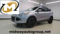 2014 Ingot Silver /Black Ford Escape SE (1FMCU0GX0EU) with an EcoBoost 1.6L I4 GTDi DOHC Turbocharged VCT engine, Automatic transmission, located at 15300 Midway Rd., Addison, TX, 75001, (972) 702-0011, 32.958321, -96.838074 - 2014 Ford Escape SE<br>Now Available at Midway Auto Group Addison, Texas<br><br>Versatile, efficient, and packed with comfort, the 2014 Ford Escape SE is a smart choice for drivers who need capability without sacrificing style. Whether you're commuting through Addison or embarking on weekend getawa - Photo#0