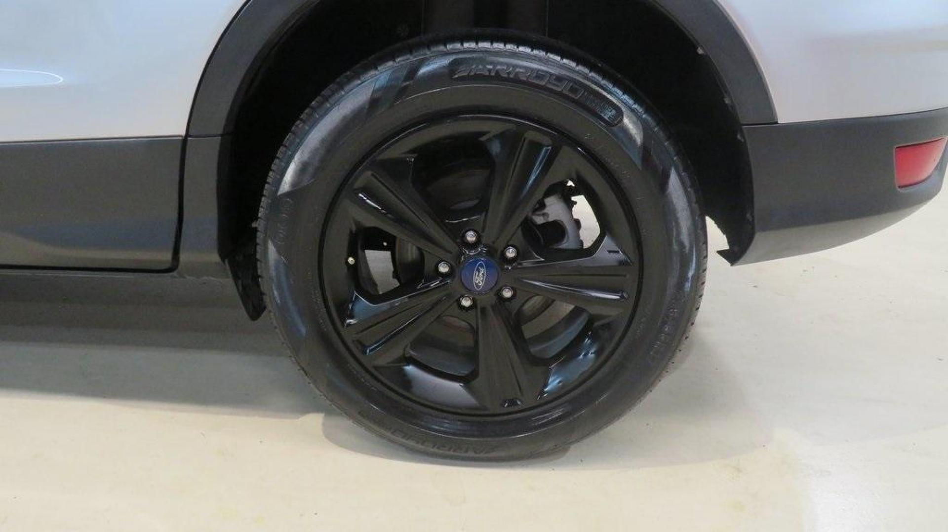2014 Ingot Silver /Black Ford Escape SE (1FMCU0GX0EU) with an EcoBoost 1.6L I4 GTDi DOHC Turbocharged VCT engine, Automatic transmission, located at 15300 Midway Rd., Addison, TX, 75001, (972) 702-0011, 32.958321, -96.838074 - 2014 Ford Escape SE<br>Now Available at Midway Auto Group Addison, Texas<br><br>Versatile, efficient, and packed with comfort, the 2014 Ford Escape SE is a smart choice for drivers who need capability without sacrificing style. Whether you're commuting through Addison or embarking on weekend getawa - Photo#11