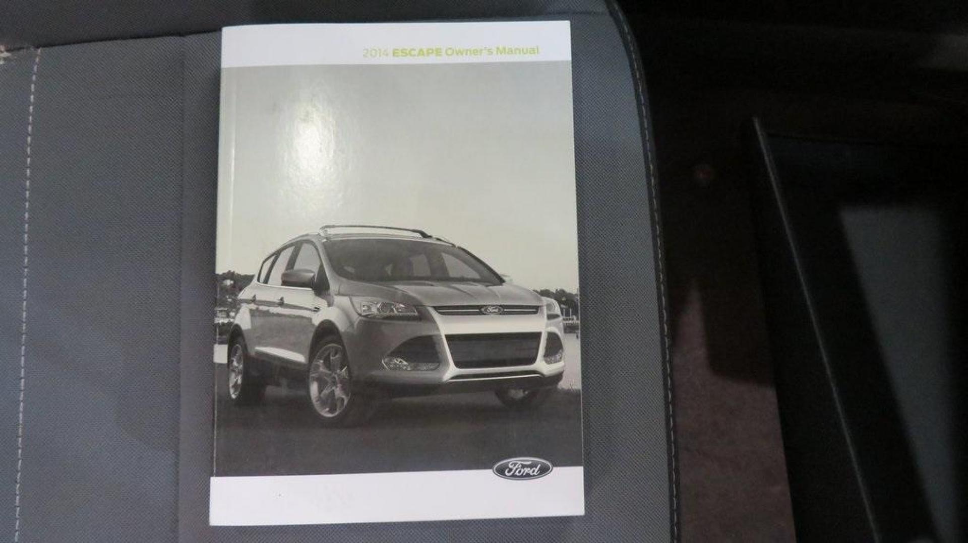 2014 Ingot Silver /Black Ford Escape SE (1FMCU0GX0EU) with an EcoBoost 1.6L I4 GTDi DOHC Turbocharged VCT engine, Automatic transmission, located at 15300 Midway Rd., Addison, TX, 75001, (972) 702-0011, 32.958321, -96.838074 - 2014 Ford Escape SE<br>Now Available at Midway Auto Group Addison, Texas<br><br>Versatile, efficient, and packed with comfort, the 2014 Ford Escape SE is a smart choice for drivers who need capability without sacrificing style. Whether you're commuting through Addison or embarking on weekend getawa - Photo#14