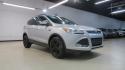 2014 Ingot Silver /Black Ford Escape SE (1FMCU0GX0EU) with an EcoBoost 1.6L I4 GTDi DOHC Turbocharged VCT engine, Automatic transmission, located at 15300 Midway Rd., Addison, TX, 75001, (972) 702-0011, 32.958321, -96.838074 - 2014 Ford Escape SE<br>Now Available at Midway Auto Group Addison, Texas<br><br>Versatile, efficient, and packed with comfort, the 2014 Ford Escape SE is a smart choice for drivers who need capability without sacrificing style. Whether you're commuting through Addison or embarking on weekend getawa - Photo#1
