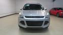 2014 Ingot Silver /Black Ford Escape SE (1FMCU0GX0EU) with an EcoBoost 1.6L I4 GTDi DOHC Turbocharged VCT engine, Automatic transmission, located at 15300 Midway Rd., Addison, TX, 75001, (972) 702-0011, 32.958321, -96.838074 - 2014 Ford Escape SE<br>Now Available at Midway Auto Group Addison, Texas<br><br>Versatile, efficient, and packed with comfort, the 2014 Ford Escape SE is a smart choice for drivers who need capability without sacrificing style. Whether you're commuting through Addison or embarking on weekend getawa - Photo#6