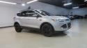 2014 Ingot Silver /Black Ford Escape SE (1FMCU0GX0EU) with an EcoBoost 1.6L I4 GTDi DOHC Turbocharged VCT engine, Automatic transmission, located at 15300 Midway Rd., Addison, TX, 75001, (972) 702-0011, 32.958321, -96.838074 - 2014 Ford Escape SE<br>Now Available at Midway Auto Group Addison, Texas<br><br>Versatile, efficient, and packed with comfort, the 2014 Ford Escape SE is a smart choice for drivers who need capability without sacrificing style. Whether you're commuting through Addison or embarking on weekend getawa - Photo#7