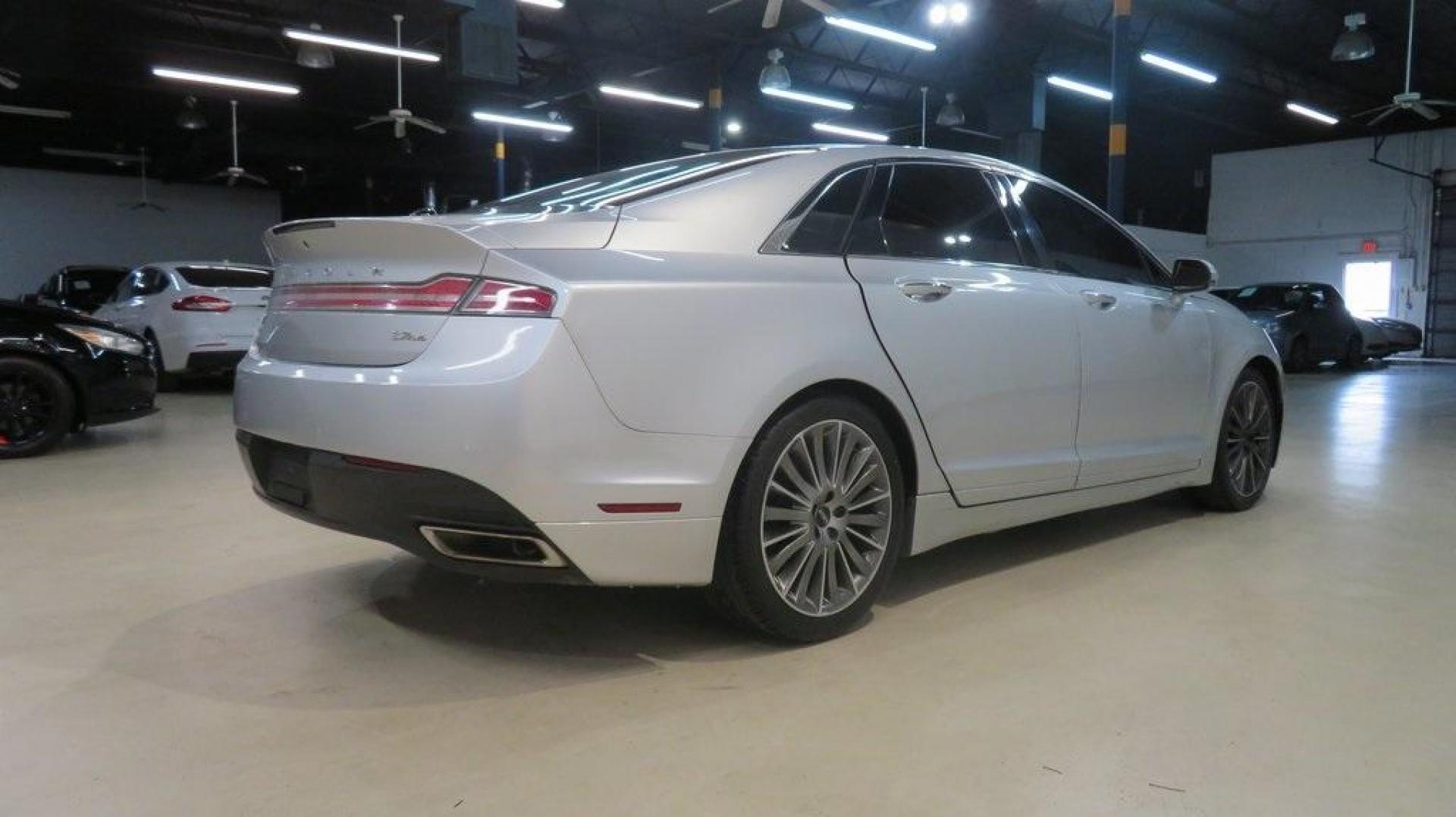 2016 Ingot Silver /Ebony Lincoln MKZ Base (3LN6L2JKXGR) with an 3.7L V6 Ti-VCT 24V engine, Automatic transmission, located at 15300 Midway Rd., Addison, TX, 75001, (972) 702-0011, 32.958321, -96.838074 - Photo#2