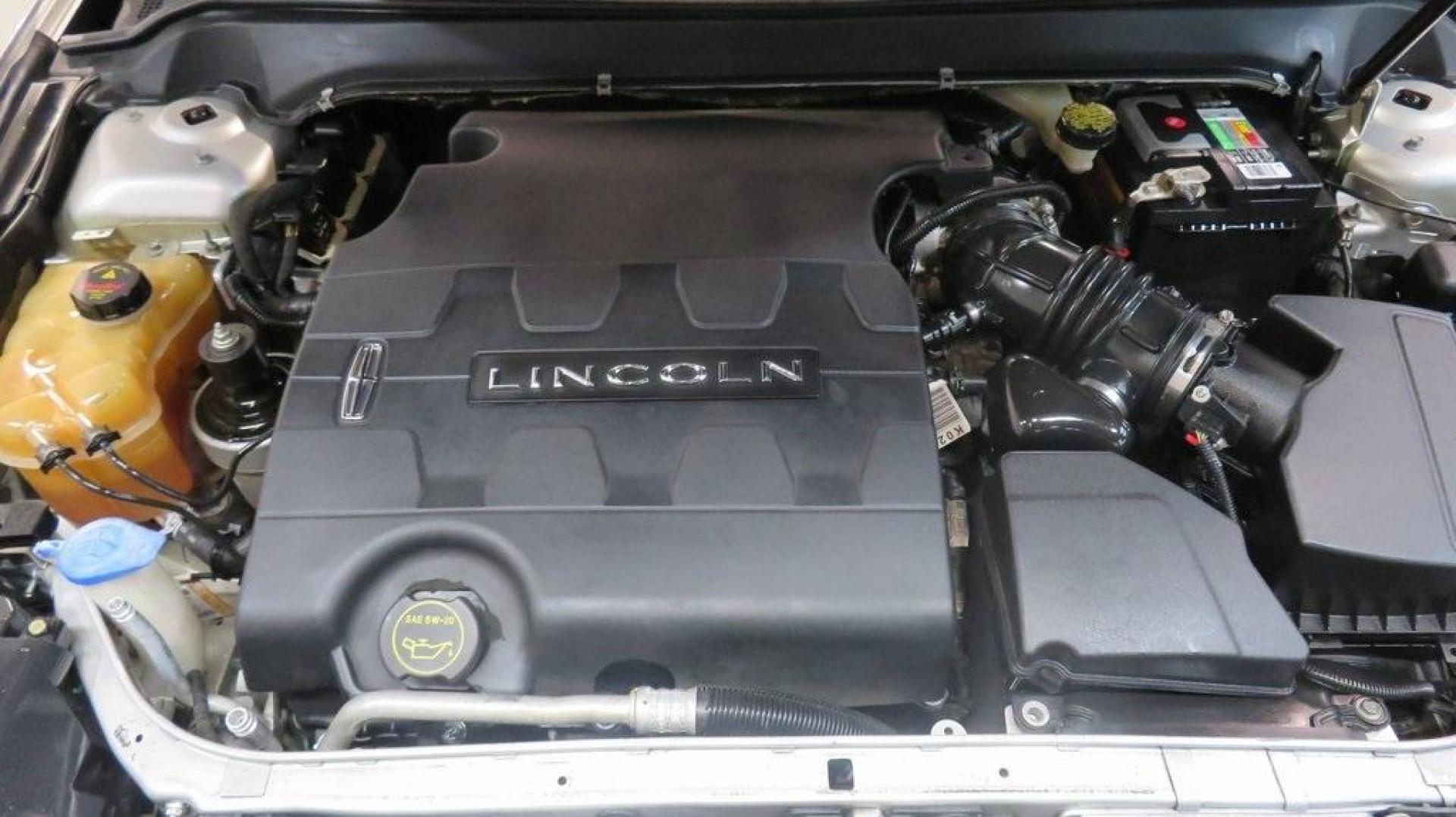 2016 Ingot Silver /Ebony Lincoln MKZ Base (3LN6L2JKXGR) with an 3.7L V6 Ti-VCT 24V engine, Automatic transmission, located at 15300 Midway Rd., Addison, TX, 75001, (972) 702-0011, 32.958321, -96.838074 - Photo#30