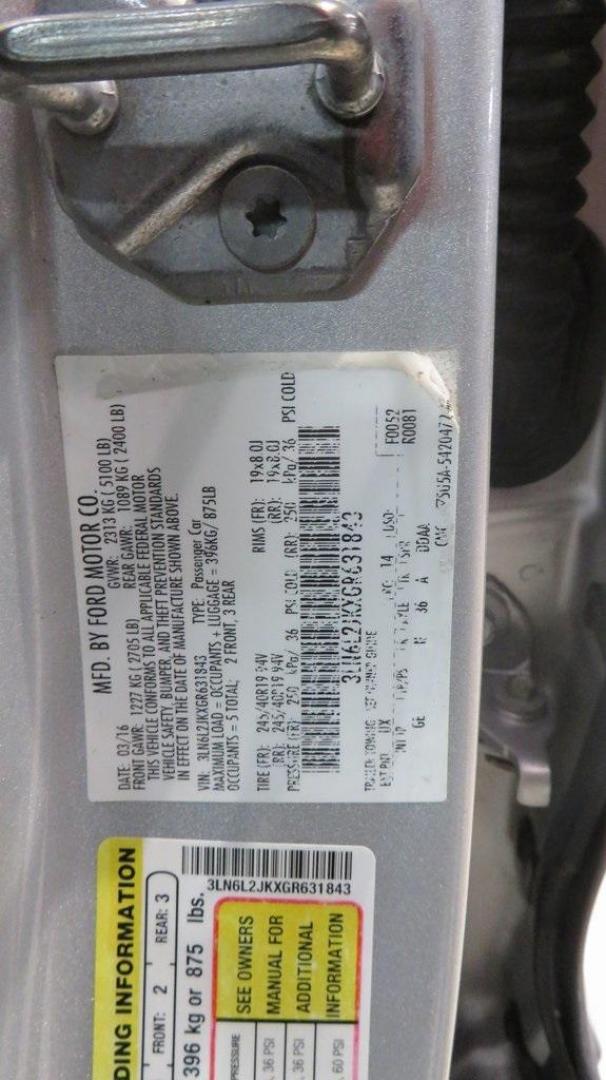 2016 Ingot Silver /Ebony Lincoln MKZ Base (3LN6L2JKXGR) with an 3.7L V6 Ti-VCT 24V engine, Automatic transmission, located at 15300 Midway Rd., Addison, TX, 75001, (972) 702-0011, 32.958321, -96.838074 - Photo#32