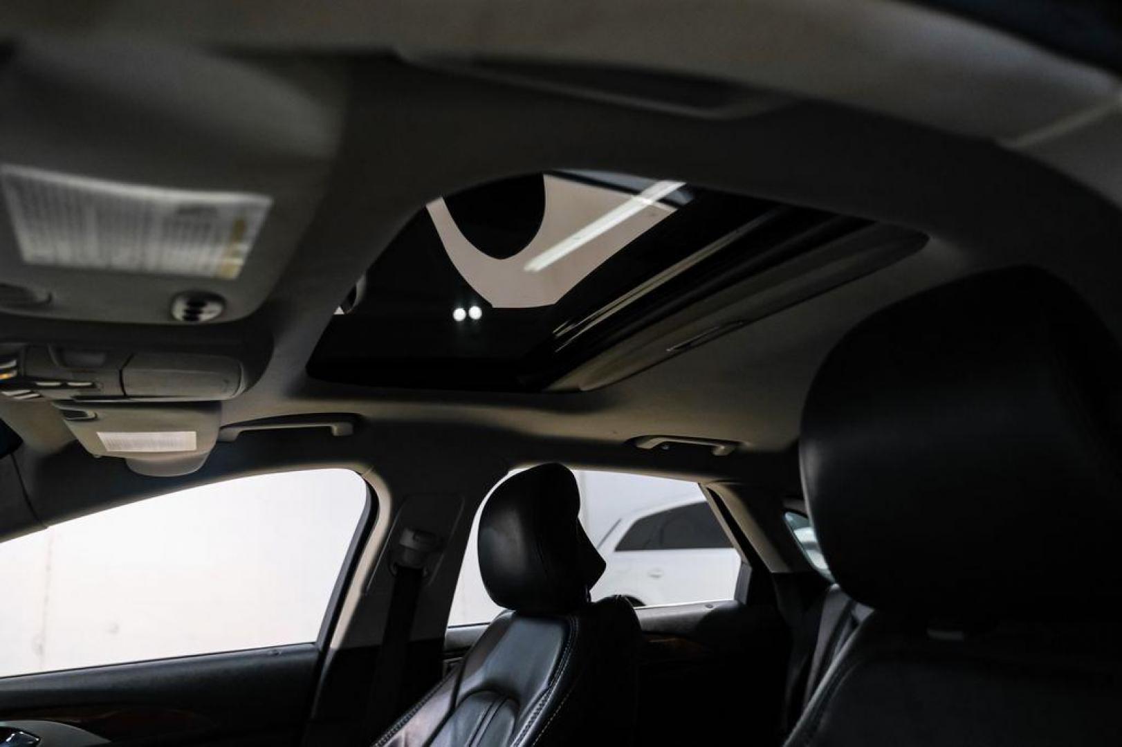 2016 Ingot Silver /Ebony Lincoln MKZ Base (3LN6L2JKXGR) with an 3.7L V6 Ti-VCT 24V engine, Automatic transmission, located at 15300 Midway Rd., Addison, TX, 75001, (972) 702-0011, 32.958321, -96.838074 - 2016 Lincoln MKZ<br>Now Available at Midway Auto Group Addison, Texas<br><br>With elegant styling, smooth turbocharged performance, and a premium interior, the 2016 Lincoln MKZ delivers a refined driving experience thats built to impress. Ideal for drivers looking to elevate their daily commute or - Photo#4