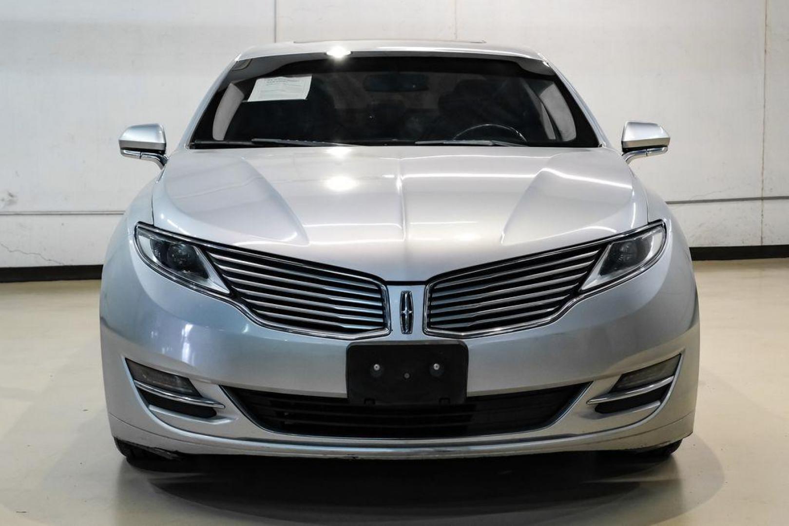 2016 Ingot Silver /Ebony Lincoln MKZ Base (3LN6L2JKXGR) with an 3.7L V6 Ti-VCT 24V engine, Automatic transmission, located at 15300 Midway Rd., Addison, TX, 75001, (972) 702-0011, 32.958321, -96.838074 - 2016 Lincoln MKZ<br>Now Available at Midway Auto Group Addison, Texas<br><br>With elegant styling, smooth turbocharged performance, and a premium interior, the 2016 Lincoln MKZ delivers a refined driving experience thats built to impress. Ideal for drivers looking to elevate their daily commute or - Photo#5