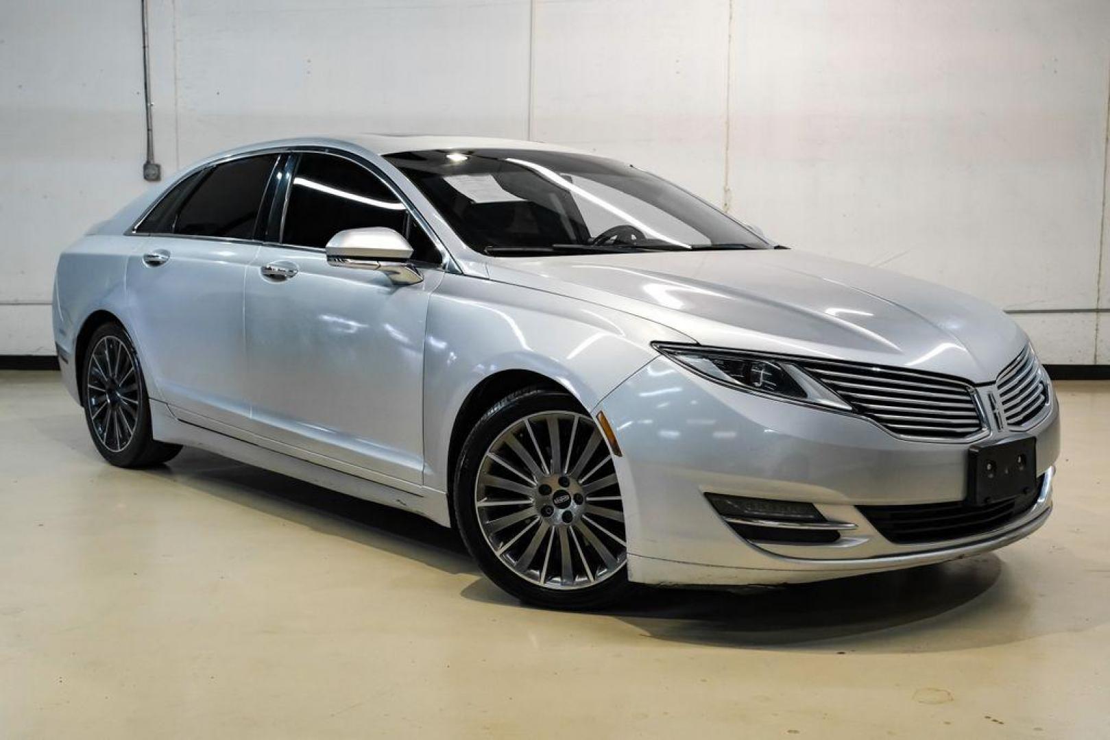 2016 Ingot Silver /Ebony Lincoln MKZ Base (3LN6L2JKXGR) with an 3.7L V6 Ti-VCT 24V engine, Automatic transmission, located at 15300 Midway Rd., Addison, TX, 75001, (972) 702-0011, 32.958321, -96.838074 - 2016 Lincoln MKZ<br>Now Available at Midway Auto Group Addison, Texas<br><br>With elegant styling, smooth turbocharged performance, and a premium interior, the 2016 Lincoln MKZ delivers a refined driving experience thats built to impress. Ideal for drivers looking to elevate their daily commute or - Photo#6