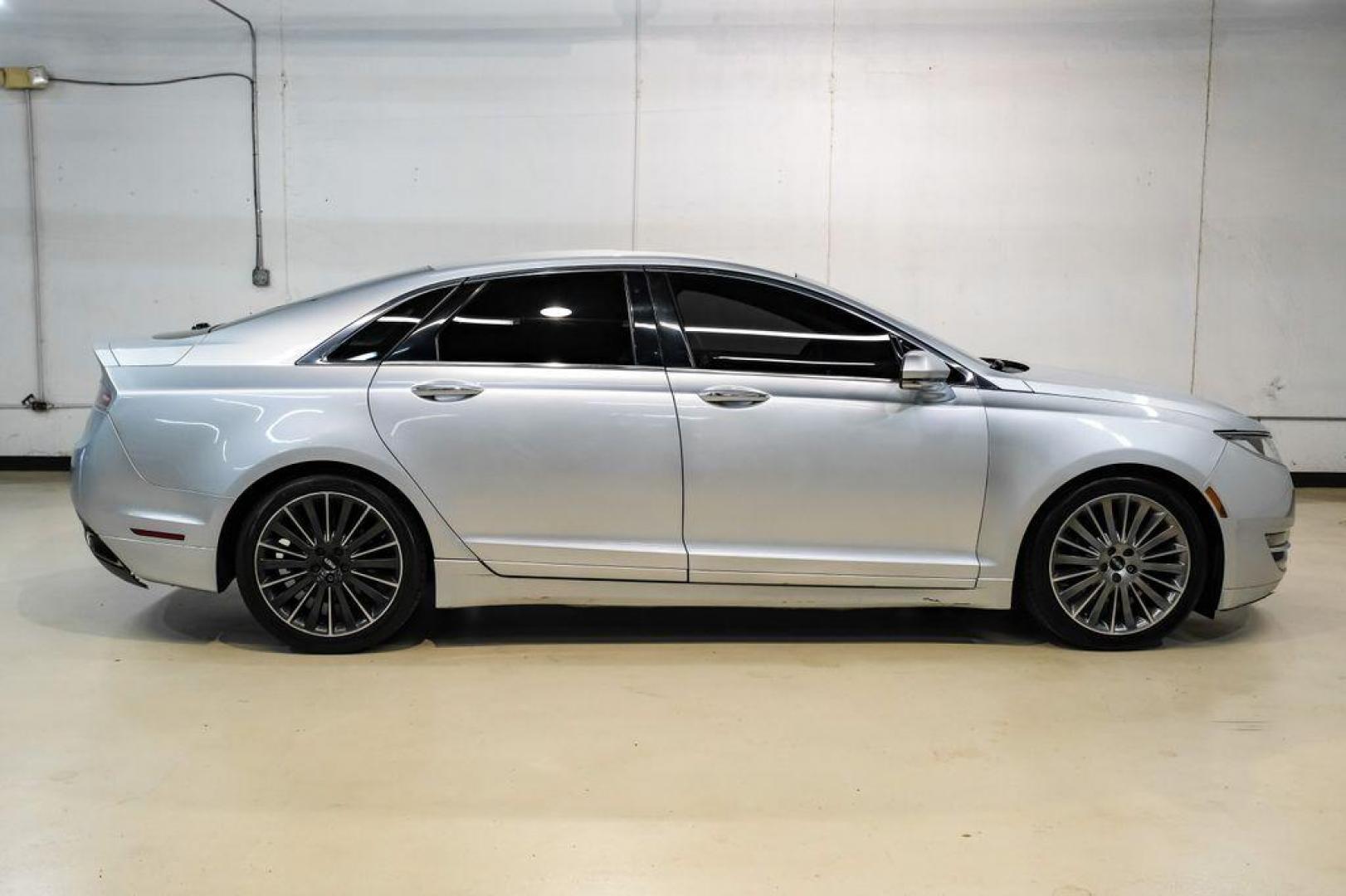 2016 Ingot Silver /Ebony Lincoln MKZ Base (3LN6L2JKXGR) with an 3.7L V6 Ti-VCT 24V engine, Automatic transmission, located at 15300 Midway Rd., Addison, TX, 75001, (972) 702-0011, 32.958321, -96.838074 - 2016 Lincoln MKZ<br>Now Available at Midway Auto Group Addison, Texas<br><br>With elegant styling, smooth turbocharged performance, and a premium interior, the 2016 Lincoln MKZ delivers a refined driving experience thats built to impress. Ideal for drivers looking to elevate their daily commute or - Photo#7