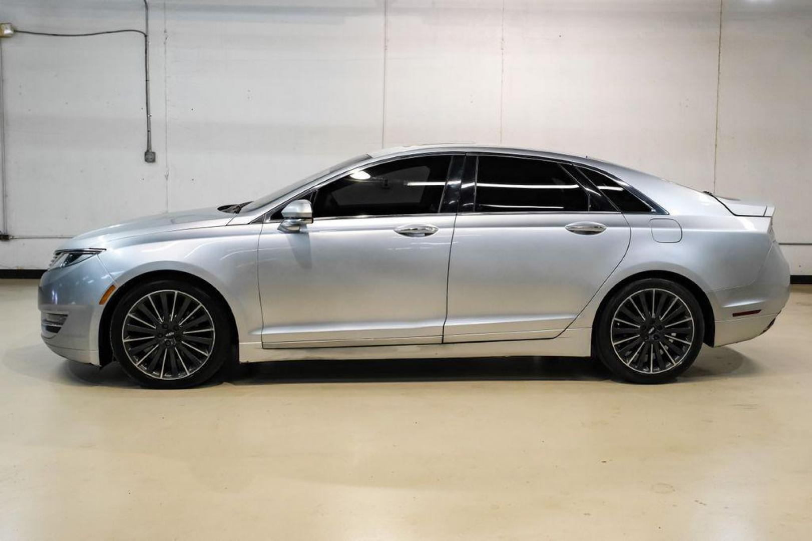 2016 Ingot Silver /Ebony Lincoln MKZ Base (3LN6L2JKXGR) with an 3.7L V6 Ti-VCT 24V engine, Automatic transmission, located at 15300 Midway Rd., Addison, TX, 75001, (972) 702-0011, 32.958321, -96.838074 - 2016 Lincoln MKZ<br>Now Available at Midway Auto Group Addison, Texas<br><br>With elegant styling, smooth turbocharged performance, and a premium interior, the 2016 Lincoln MKZ delivers a refined driving experience thats built to impress. Ideal for drivers looking to elevate their daily commute or - Photo#11