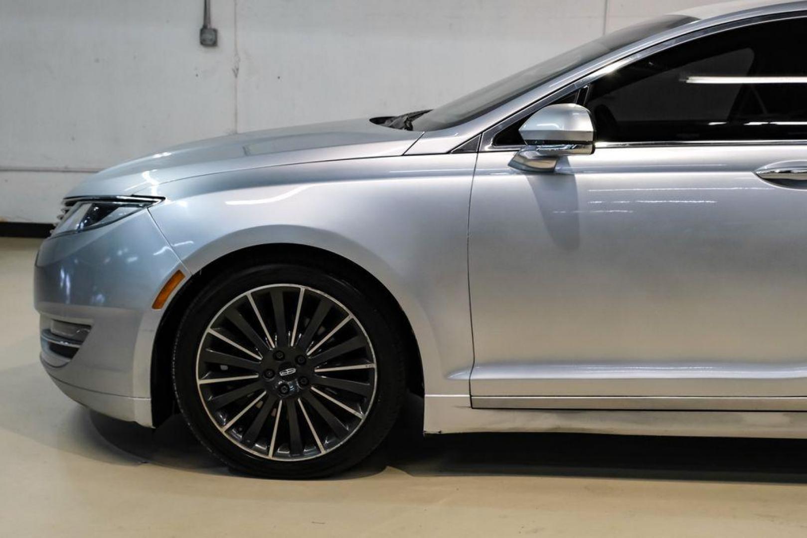 2016 Ingot Silver /Ebony Lincoln MKZ Base (3LN6L2JKXGR) with an 3.7L V6 Ti-VCT 24V engine, Automatic transmission, located at 15300 Midway Rd., Addison, TX, 75001, (972) 702-0011, 32.958321, -96.838074 - 2016 Lincoln MKZ<br>Now Available at Midway Auto Group Addison, Texas<br><br>With elegant styling, smooth turbocharged performance, and a premium interior, the 2016 Lincoln MKZ delivers a refined driving experience thats built to impress. Ideal for drivers looking to elevate their daily commute or - Photo#12