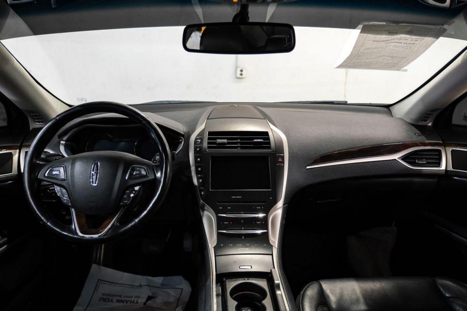 2016 Ingot Silver /Ebony Lincoln MKZ Base (3LN6L2JKXGR) with an 3.7L V6 Ti-VCT 24V engine, Automatic transmission, located at 15300 Midway Rd., Addison, TX, 75001, (972) 702-0011, 32.958321, -96.838074 - 2016 Lincoln MKZ<br>Now Available at Midway Auto Group Addison, Texas<br><br>With elegant styling, smooth turbocharged performance, and a premium interior, the 2016 Lincoln MKZ delivers a refined driving experience thats built to impress. Ideal for drivers looking to elevate their daily commute or - Photo#16