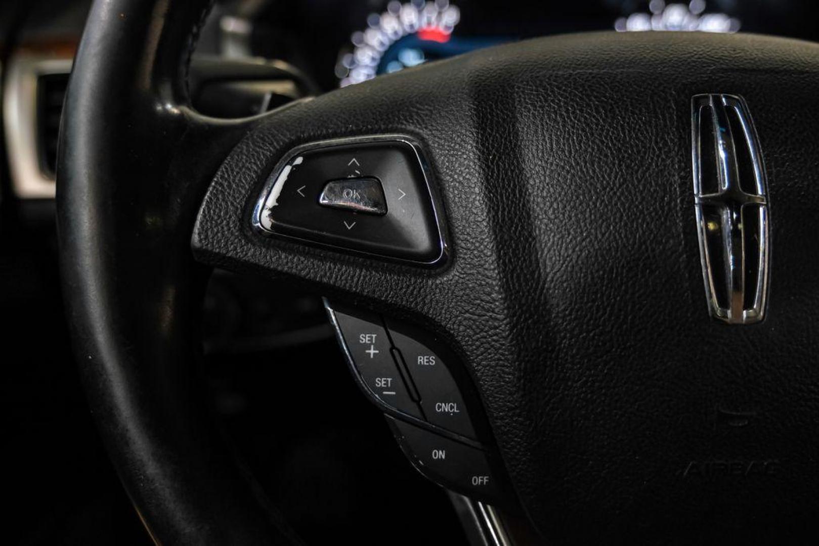 2016 Ingot Silver /Ebony Lincoln MKZ Base (3LN6L2JKXGR) with an 3.7L V6 Ti-VCT 24V engine, Automatic transmission, located at 15300 Midway Rd., Addison, TX, 75001, (972) 702-0011, 32.958321, -96.838074 - 2016 Lincoln MKZ<br>Now Available at Midway Auto Group Addison, Texas<br><br>With elegant styling, smooth turbocharged performance, and a premium interior, the 2016 Lincoln MKZ delivers a refined driving experience thats built to impress. Ideal for drivers looking to elevate their daily commute or - Photo#18