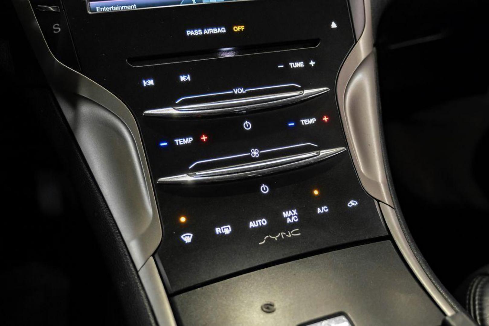 2016 Ingot Silver /Ebony Lincoln MKZ Base (3LN6L2JKXGR) with an 3.7L V6 Ti-VCT 24V engine, Automatic transmission, located at 15300 Midway Rd., Addison, TX, 75001, (972) 702-0011, 32.958321, -96.838074 - 2016 Lincoln MKZ<br>Now Available at Midway Auto Group Addison, Texas<br><br>With elegant styling, smooth turbocharged performance, and a premium interior, the 2016 Lincoln MKZ delivers a refined driving experience thats built to impress. Ideal for drivers looking to elevate their daily commute or - Photo#27