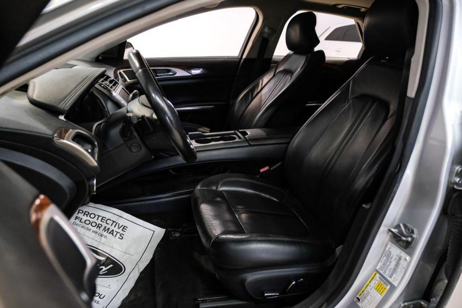 2016 Ingot Silver /Ebony Lincoln MKZ Base (3LN6L2JKXGR) with an 3.7L V6 Ti-VCT 24V engine, Automatic transmission, located at 15300 Midway Rd., Addison, TX, 75001, (972) 702-0011, 32.958321, -96.838074 - 2016 Lincoln MKZ<br>Now Available at Midway Auto Group Addison, Texas<br><br>With elegant styling, smooth turbocharged performance, and a premium interior, the 2016 Lincoln MKZ delivers a refined driving experience thats built to impress. Ideal for drivers looking to elevate their daily commute or - Photo#30