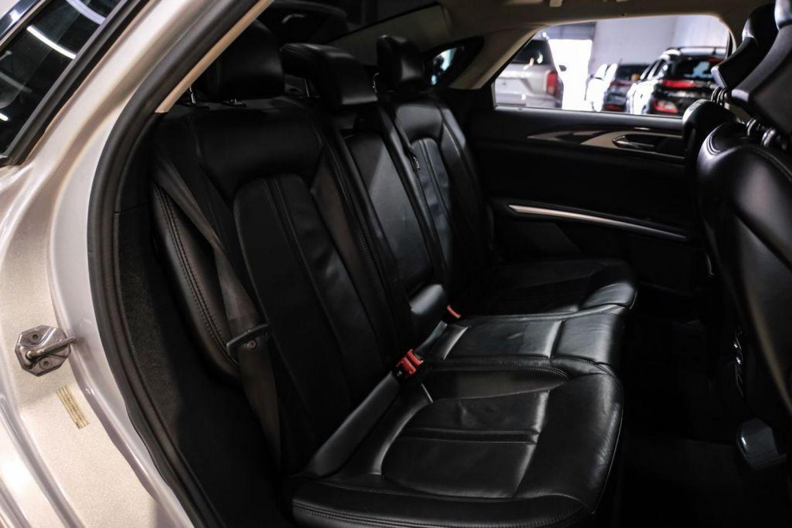 2016 Ingot Silver /Ebony Lincoln MKZ Base (3LN6L2JKXGR) with an 3.7L V6 Ti-VCT 24V engine, Automatic transmission, located at 15300 Midway Rd., Addison, TX, 75001, (972) 702-0011, 32.958321, -96.838074 - 2016 Lincoln MKZ<br>Now Available at Midway Auto Group Addison, Texas<br><br>With elegant styling, smooth turbocharged performance, and a premium interior, the 2016 Lincoln MKZ delivers a refined driving experience thats built to impress. Ideal for drivers looking to elevate their daily commute or - Photo#33