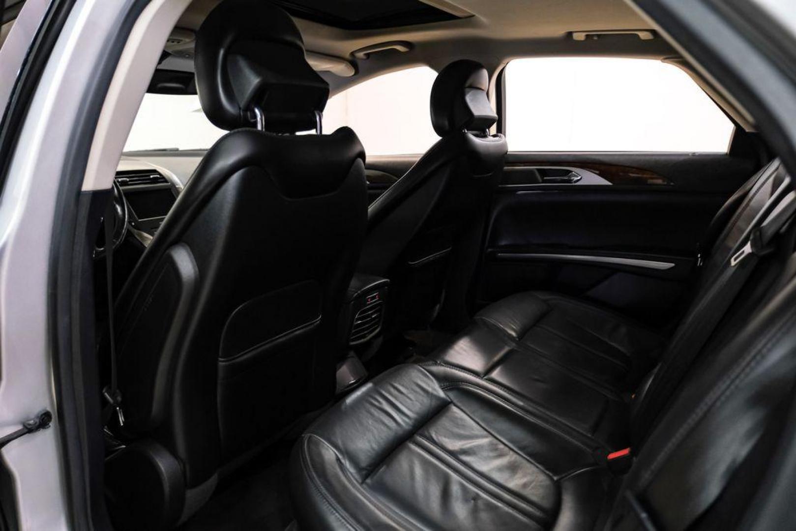 2016 Ingot Silver /Ebony Lincoln MKZ Base (3LN6L2JKXGR) with an 3.7L V6 Ti-VCT 24V engine, Automatic transmission, located at 15300 Midway Rd., Addison, TX, 75001, (972) 702-0011, 32.958321, -96.838074 - 2016 Lincoln MKZ<br>Now Available at Midway Auto Group Addison, Texas<br><br>With elegant styling, smooth turbocharged performance, and a premium interior, the 2016 Lincoln MKZ delivers a refined driving experience thats built to impress. Ideal for drivers looking to elevate their daily commute or - Photo#35