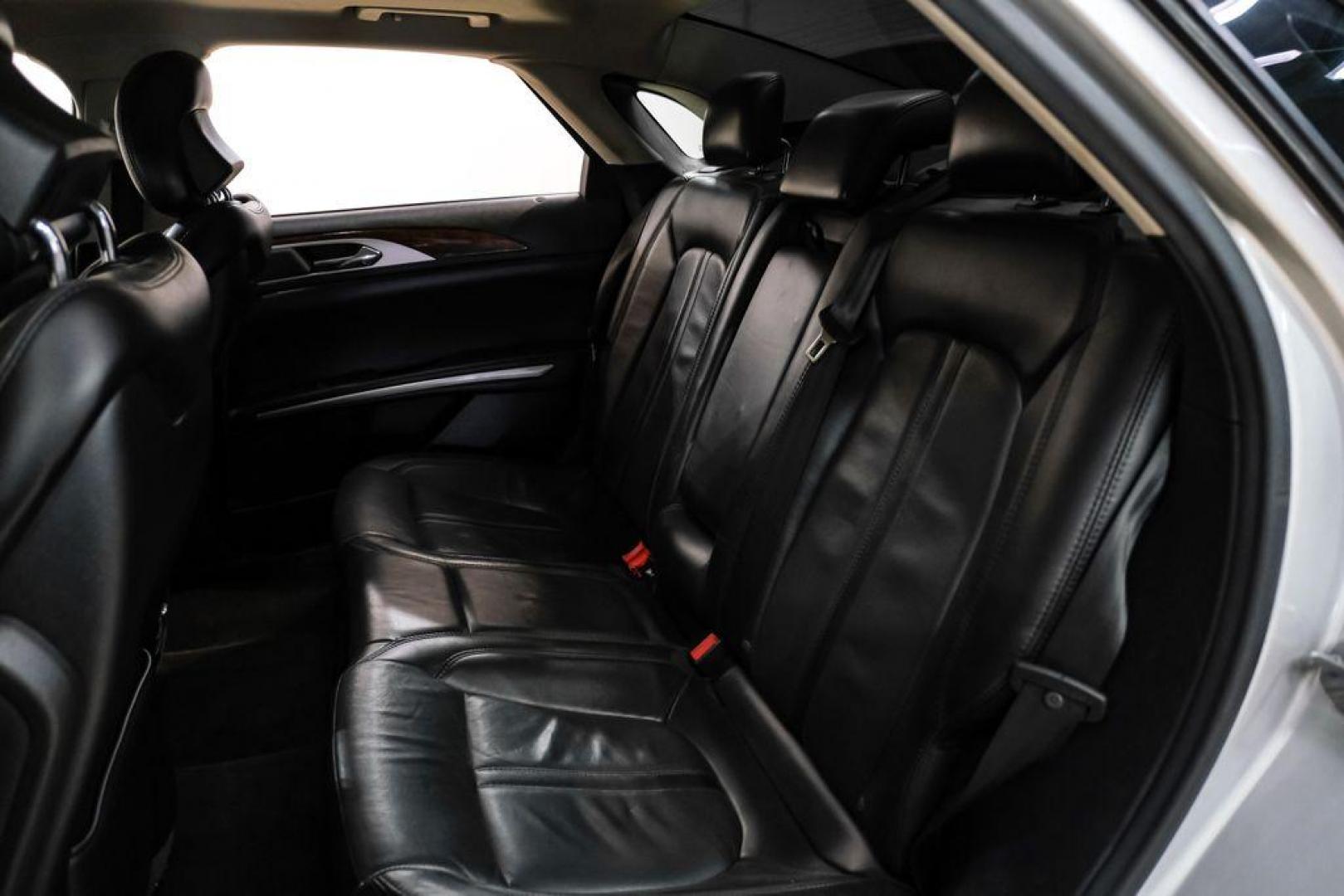 2016 Ingot Silver /Ebony Lincoln MKZ Base (3LN6L2JKXGR) with an 3.7L V6 Ti-VCT 24V engine, Automatic transmission, located at 15300 Midway Rd., Addison, TX, 75001, (972) 702-0011, 32.958321, -96.838074 - 2016 Lincoln MKZ<br>Now Available at Midway Auto Group Addison, Texas<br><br>With elegant styling, smooth turbocharged performance, and a premium interior, the 2016 Lincoln MKZ delivers a refined driving experience thats built to impress. Ideal for drivers looking to elevate their daily commute or - Photo#36