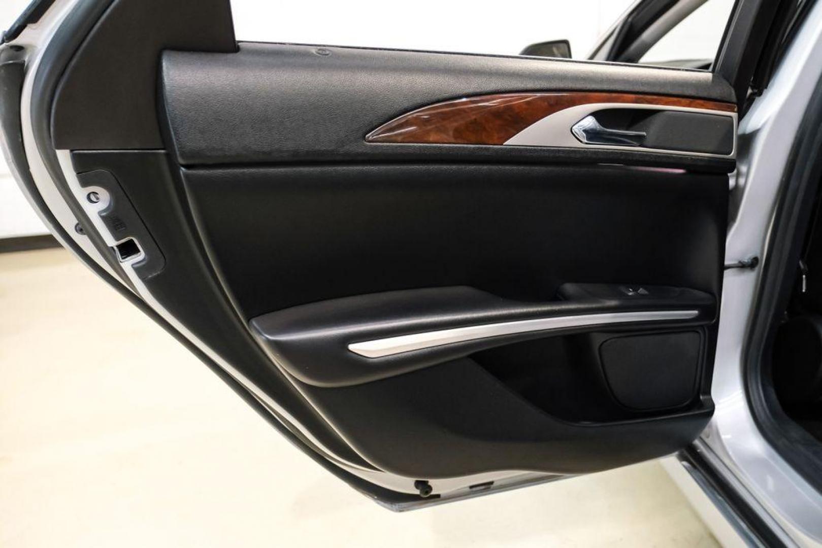 2016 Ingot Silver /Ebony Lincoln MKZ Base (3LN6L2JKXGR) with an 3.7L V6 Ti-VCT 24V engine, Automatic transmission, located at 15300 Midway Rd., Addison, TX, 75001, (972) 702-0011, 32.958321, -96.838074 - 2016 Lincoln MKZ<br>Now Available at Midway Auto Group Addison, Texas<br><br>With elegant styling, smooth turbocharged performance, and a premium interior, the 2016 Lincoln MKZ delivers a refined driving experience thats built to impress. Ideal for drivers looking to elevate their daily commute or - Photo#42