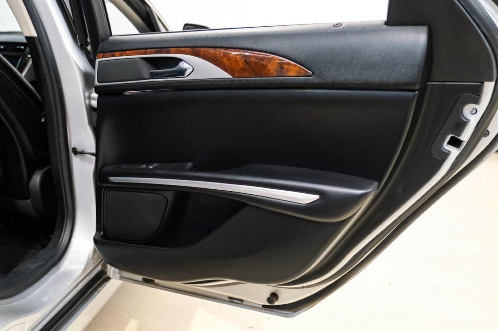 2016 Ingot Silver /Ebony Lincoln MKZ Base (3LN6L2JKXGR) with an 3.7L V6 Ti-VCT 24V engine, Automatic transmission, located at 15300 Midway Rd., Addison, TX, 75001, (972) 702-0011, 32.958321, -96.838074 - 2016 Lincoln MKZ<br>Now Available at Midway Auto Group Addison, Texas<br><br>With elegant styling, smooth turbocharged performance, and a premium interior, the 2016 Lincoln MKZ delivers a refined driving experience thats built to impress. Ideal for drivers looking to elevate their daily commute or - Photo#43