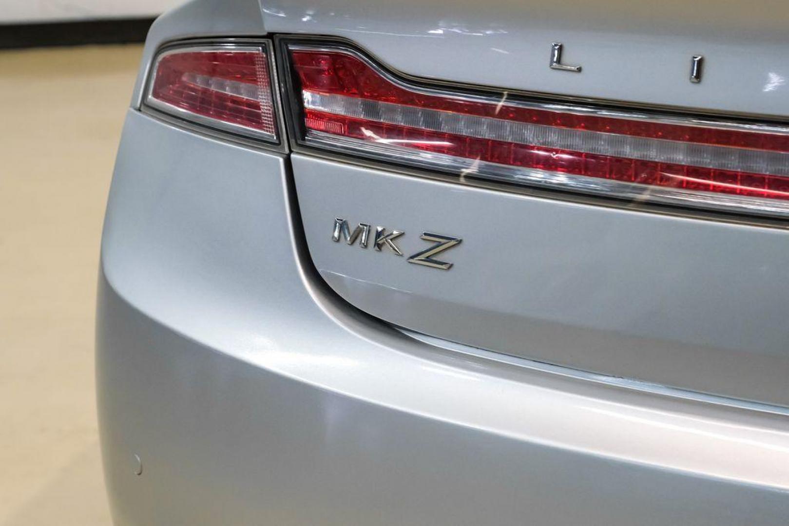 2016 Ingot Silver /Ebony Lincoln MKZ Base (3LN6L2JKXGR) with an 3.7L V6 Ti-VCT 24V engine, Automatic transmission, located at 15300 Midway Rd., Addison, TX, 75001, (972) 702-0011, 32.958321, -96.838074 - 2016 Lincoln MKZ<br>Now Available at Midway Auto Group Addison, Texas<br><br>With elegant styling, smooth turbocharged performance, and a premium interior, the 2016 Lincoln MKZ delivers a refined driving experience thats built to impress. Ideal for drivers looking to elevate their daily commute or - Photo#46