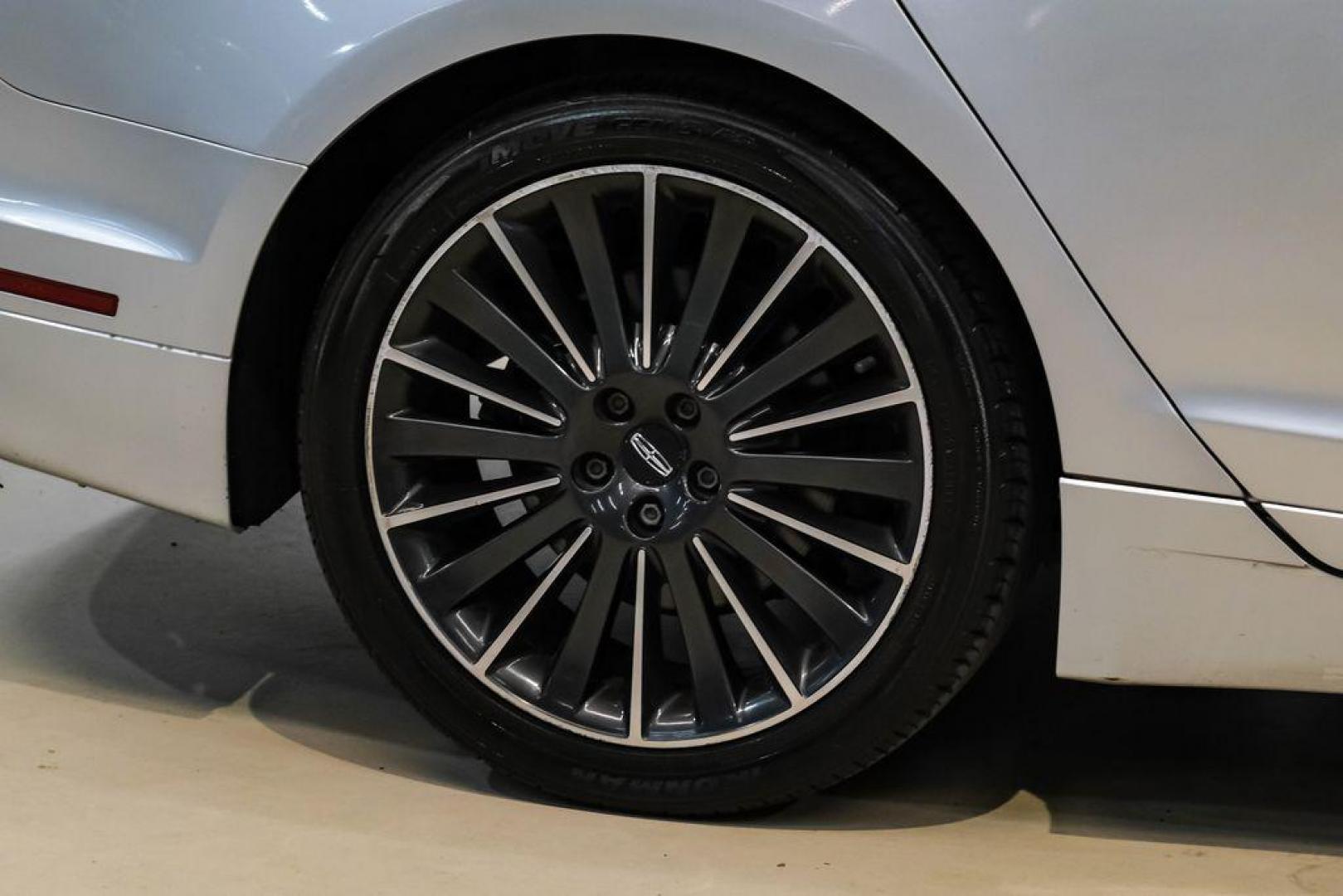 2016 Ingot Silver /Ebony Lincoln MKZ Base (3LN6L2JKXGR) with an 3.7L V6 Ti-VCT 24V engine, Automatic transmission, located at 15300 Midway Rd., Addison, TX, 75001, (972) 702-0011, 32.958321, -96.838074 - 2016 Lincoln MKZ<br>Now Available at Midway Auto Group Addison, Texas<br><br>With elegant styling, smooth turbocharged performance, and a premium interior, the 2016 Lincoln MKZ delivers a refined driving experience thats built to impress. Ideal for drivers looking to elevate their daily commute or - Photo#52