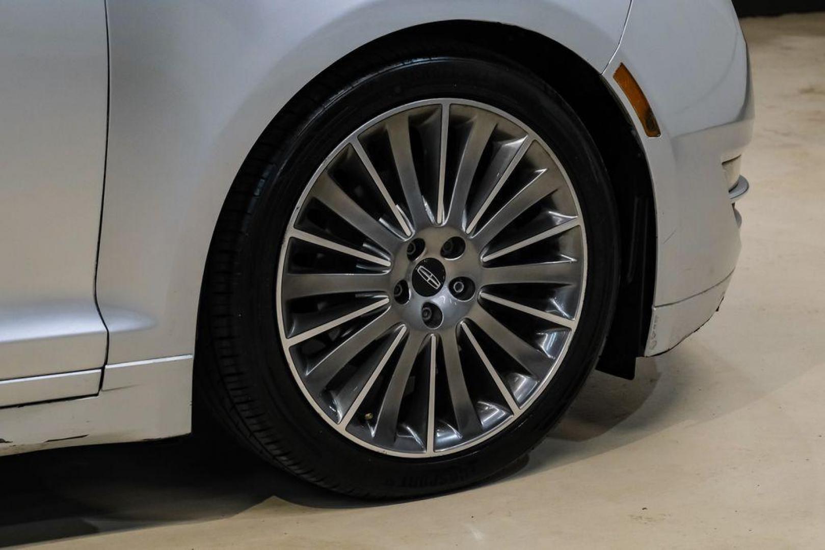 2016 Ingot Silver /Ebony Lincoln MKZ Base (3LN6L2JKXGR) with an 3.7L V6 Ti-VCT 24V engine, Automatic transmission, located at 15300 Midway Rd., Addison, TX, 75001, (972) 702-0011, 32.958321, -96.838074 - 2016 Lincoln MKZ<br>Now Available at Midway Auto Group Addison, Texas<br><br>With elegant styling, smooth turbocharged performance, and a premium interior, the 2016 Lincoln MKZ delivers a refined driving experience thats built to impress. Ideal for drivers looking to elevate their daily commute or - Photo#53