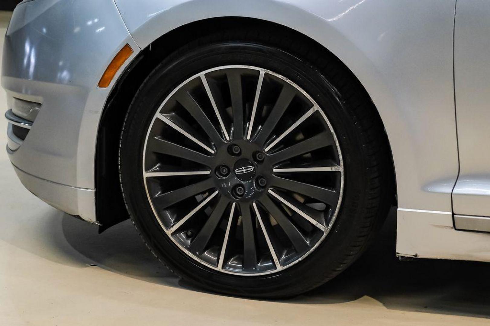 2016 Ingot Silver /Ebony Lincoln MKZ Base (3LN6L2JKXGR) with an 3.7L V6 Ti-VCT 24V engine, Automatic transmission, located at 15300 Midway Rd., Addison, TX, 75001, (972) 702-0011, 32.958321, -96.838074 - 2016 Lincoln MKZ<br>Now Available at Midway Auto Group Addison, Texas<br><br>With elegant styling, smooth turbocharged performance, and a premium interior, the 2016 Lincoln MKZ delivers a refined driving experience thats built to impress. Ideal for drivers looking to elevate their daily commute or - Photo#54