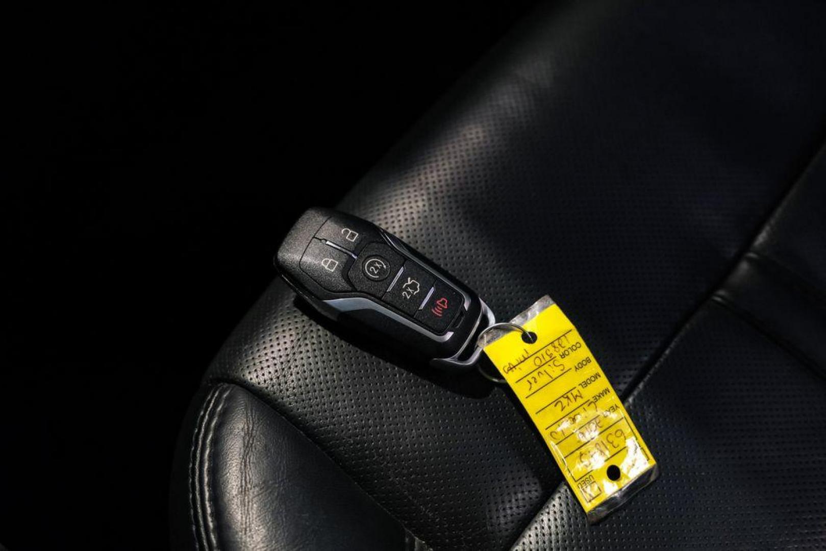 2016 Ingot Silver /Ebony Lincoln MKZ Base (3LN6L2JKXGR) with an 3.7L V6 Ti-VCT 24V engine, Automatic transmission, located at 15300 Midway Rd., Addison, TX, 75001, (972) 702-0011, 32.958321, -96.838074 - 2016 Lincoln MKZ<br>Now Available at Midway Auto Group Addison, Texas<br><br>With elegant styling, smooth turbocharged performance, and a premium interior, the 2016 Lincoln MKZ delivers a refined driving experience thats built to impress. Ideal for drivers looking to elevate their daily commute or - Photo#56