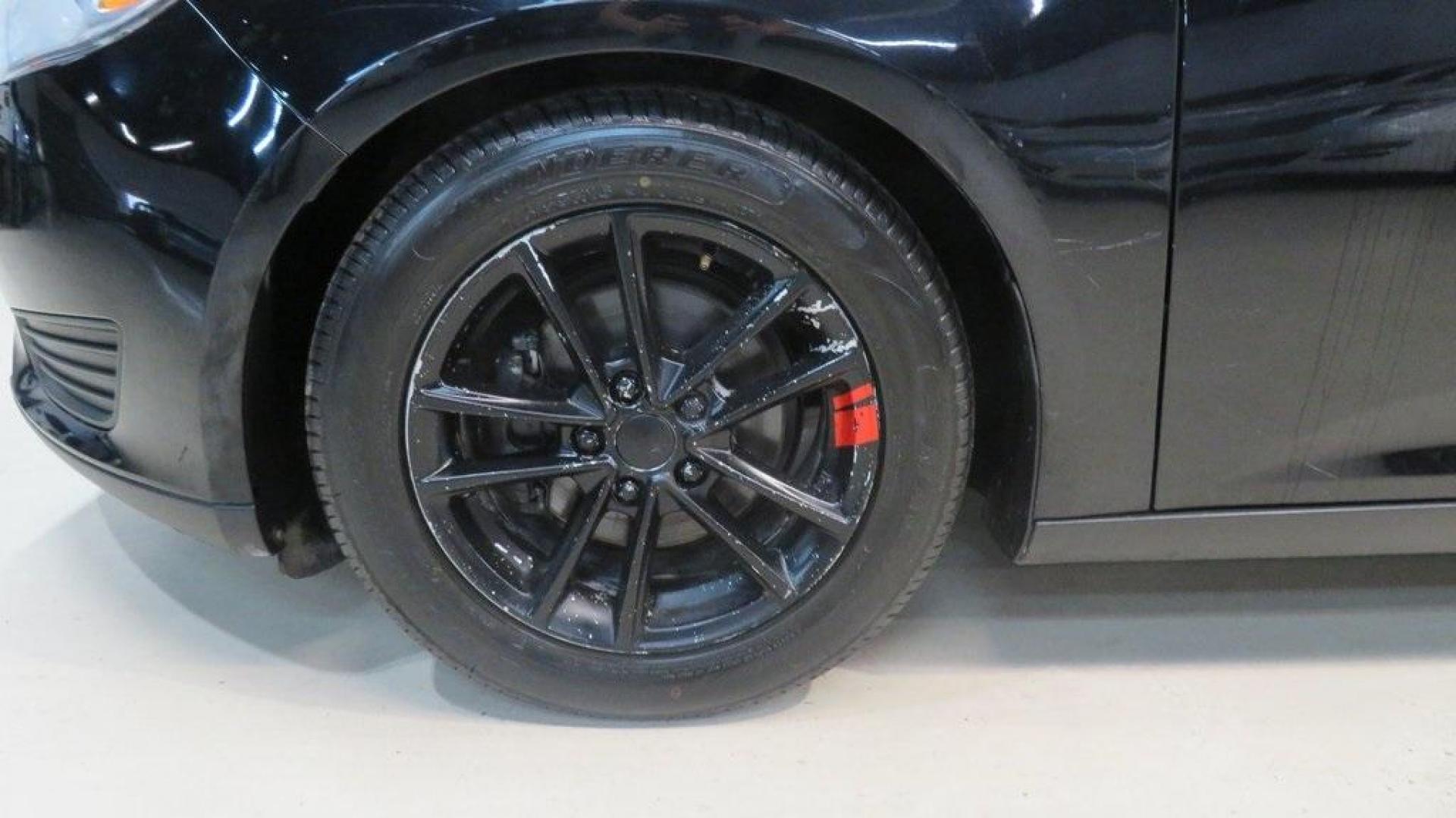 2018 Shadow Black /Charcoal Black Ford Focus SE (1FADP3F26JL) with an 2.0L I4 DGI Ti-VCT engine, Automatic transmission, located at 15300 Midway Rd., Addison, TX, 75001, (972) 702-0011, 32.958321, -96.838074 - Photo#8