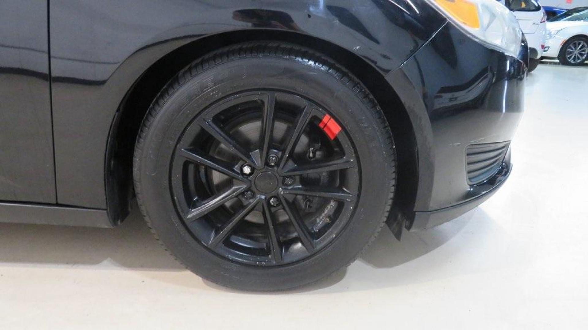 2018 Shadow Black /Charcoal Black Ford Focus SE (1FADP3F26JL) with an 2.0L I4 DGI Ti-VCT engine, Automatic transmission, located at 15300 Midway Rd., Addison, TX, 75001, (972) 702-0011, 32.958321, -96.838074 - Photo#11