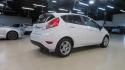 2018 Oxford White /Medium Light Stone Ford Fiesta SE (3FADP4EJ6JM) with an 1.6L I4 Ti-VCT engine, Automatic transmission, located at 15300 Midway Rd., Addison, TX, 75001, (972) 702-0011, 32.958321, -96.838074 - 2018 Ford Fiesta SE Hatchback<br>Now Available at Midway Auto Group Addison, Texas<br><br>Compact, stylish, and packed with value, the 2018 Ford Fiesta SE Hatchback is a fun-to-drive car that offers smart tech, impressive fuel economy, and hatchback versatility. Whether you're commuting through Add - Photo#2