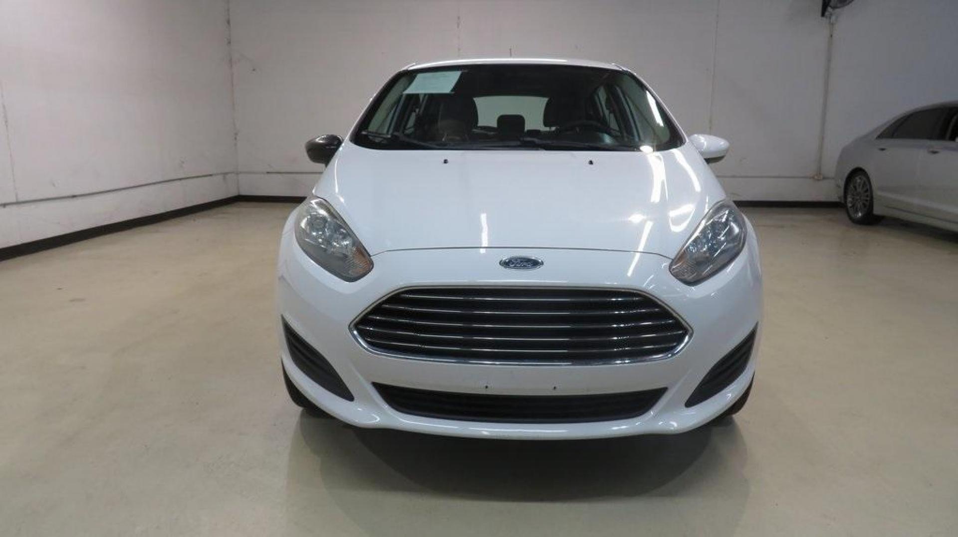 2018 Oxford White /Medium Light Stone Ford Fiesta SE (3FADP4EJ6JM) with an 1.6L I4 Ti-VCT engine, Automatic transmission, located at 15300 Midway Rd., Addison, TX, 75001, (972) 702-0011, 32.958321, -96.838074 - 2018 Ford Fiesta SE Hatchback<br>Now Available at Midway Auto Group Addison, Texas<br><br>Compact, stylish, and packed with value, the 2018 Ford Fiesta SE Hatchback is a fun-to-drive car that offers smart tech, impressive fuel economy, and hatchback versatility. Whether you're commuting through Add - Photo#5