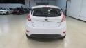2018 Oxford White /Medium Light Stone Ford Fiesta SE (3FADP4EJ6JM) with an 1.6L I4 Ti-VCT engine, Automatic transmission, located at 15300 Midway Rd., Addison, TX, 75001, (972) 702-0011, 32.958321, -96.838074 - 2018 Ford Fiesta SE Hatchback<br>Now Available at Midway Auto Group Addison, Texas<br><br>Compact, stylish, and packed with value, the 2018 Ford Fiesta SE Hatchback is a fun-to-drive car that offers smart tech, impressive fuel economy, and hatchback versatility. Whether you're commuting through Add - Photo#7