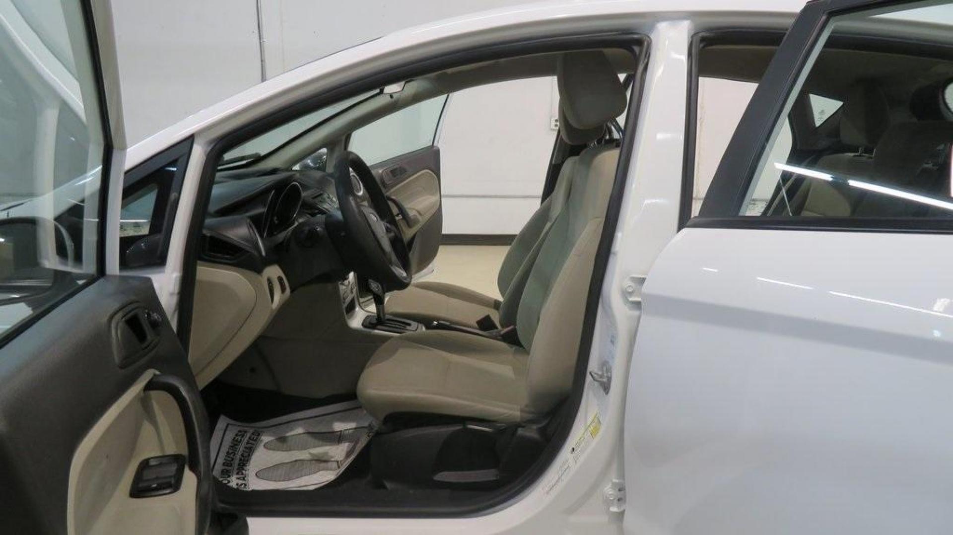 2018 Oxford White /Medium Light Stone Ford Fiesta SE (3FADP4EJ6JM) with an 1.6L I4 Ti-VCT engine, Automatic transmission, located at 15300 Midway Rd., Addison, TX, 75001, (972) 702-0011, 32.958321, -96.838074 - 2018 Ford Fiesta SE Hatchback<br>Now Available at Midway Auto Group Addison, Texas<br><br>Compact, stylish, and packed with value, the 2018 Ford Fiesta SE Hatchback is a fun-to-drive car that offers smart tech, impressive fuel economy, and hatchback versatility. Whether you're commuting through Add - Photo#12