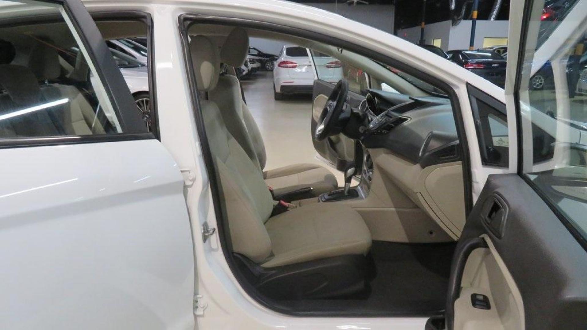 2018 Oxford White /Medium Light Stone Ford Fiesta SE (3FADP4EJ6JM) with an 1.6L I4 Ti-VCT engine, Automatic transmission, located at 15300 Midway Rd., Addison, TX, 75001, (972) 702-0011, 32.958321, -96.838074 - 2018 Ford Fiesta SE Hatchback<br>Now Available at Midway Auto Group Addison, Texas<br><br>Compact, stylish, and packed with value, the 2018 Ford Fiesta SE Hatchback is a fun-to-drive car that offers smart tech, impressive fuel economy, and hatchback versatility. Whether you're commuting through Add - Photo#13