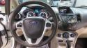 2018 Oxford White /Medium Light Stone Ford Fiesta SE (3FADP4EJ6JM) with an 1.6L I4 Ti-VCT engine, Automatic transmission, located at 15300 Midway Rd., Addison, TX, 75001, (972) 702-0011, 32.958321, -96.838074 - 2018 Ford Fiesta SE Hatchback<br>Now Available at Midway Auto Group Addison, Texas<br><br>Compact, stylish, and packed with value, the 2018 Ford Fiesta SE Hatchback is a fun-to-drive car that offers smart tech, impressive fuel economy, and hatchback versatility. Whether you're commuting through Add - Photo#16