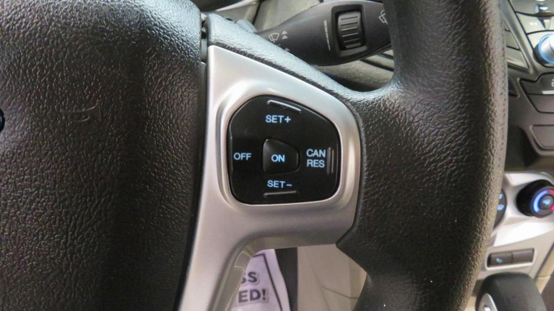 2018 Oxford White /Medium Light Stone Ford Fiesta SE (3FADP4EJ6JM) with an 1.6L I4 Ti-VCT engine, Automatic transmission, located at 15300 Midway Rd., Addison, TX, 75001, (972) 702-0011, 32.958321, -96.838074 - 2018 Ford Fiesta SE Hatchback<br>Now Available at Midway Auto Group Addison, Texas<br><br>Compact, stylish, and packed with value, the 2018 Ford Fiesta SE Hatchback is a fun-to-drive car that offers smart tech, impressive fuel economy, and hatchback versatility. Whether you're commuting through Add - Photo#22