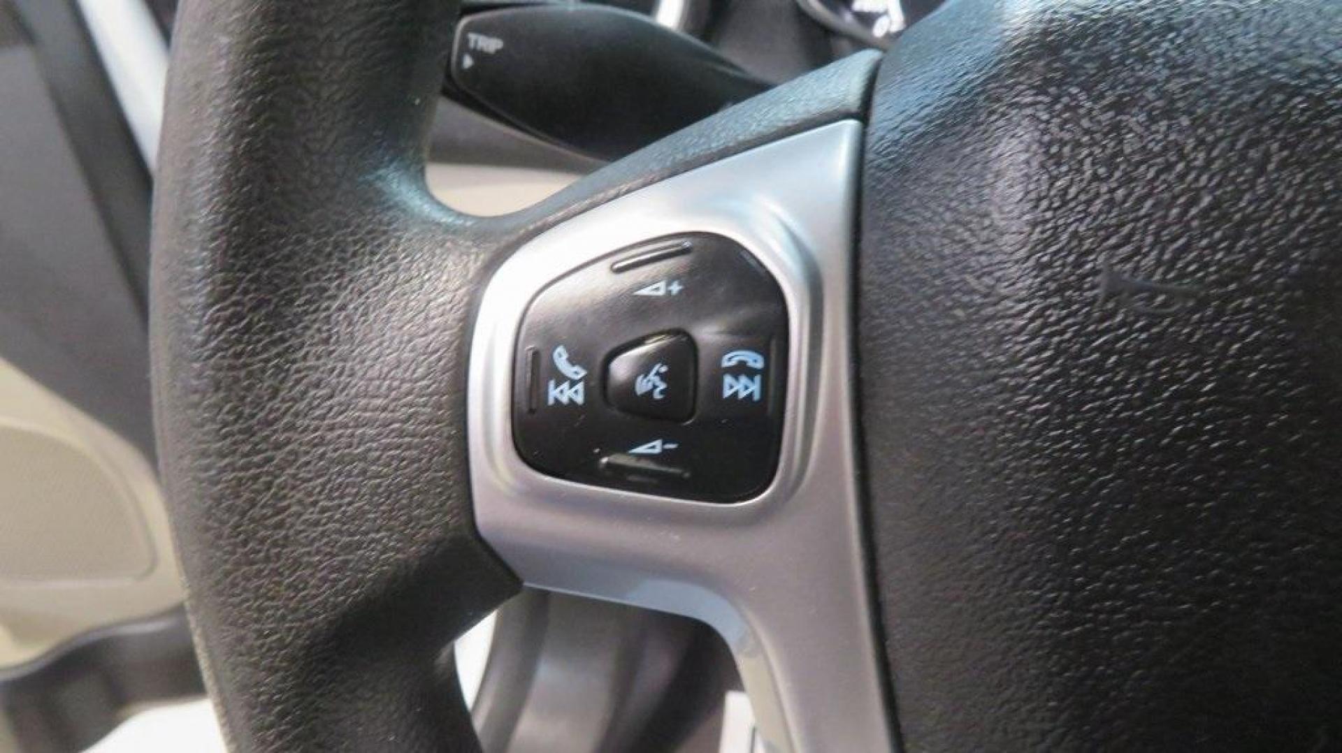 2018 Oxford White /Medium Light Stone Ford Fiesta SE (3FADP4EJ6JM) with an 1.6L I4 Ti-VCT engine, Automatic transmission, located at 15300 Midway Rd., Addison, TX, 75001, (972) 702-0011, 32.958321, -96.838074 - 2018 Ford Fiesta SE Hatchback<br>Now Available at Midway Auto Group Addison, Texas<br><br>Compact, stylish, and packed with value, the 2018 Ford Fiesta SE Hatchback is a fun-to-drive car that offers smart tech, impressive fuel economy, and hatchback versatility. Whether you're commuting through Add - Photo#23