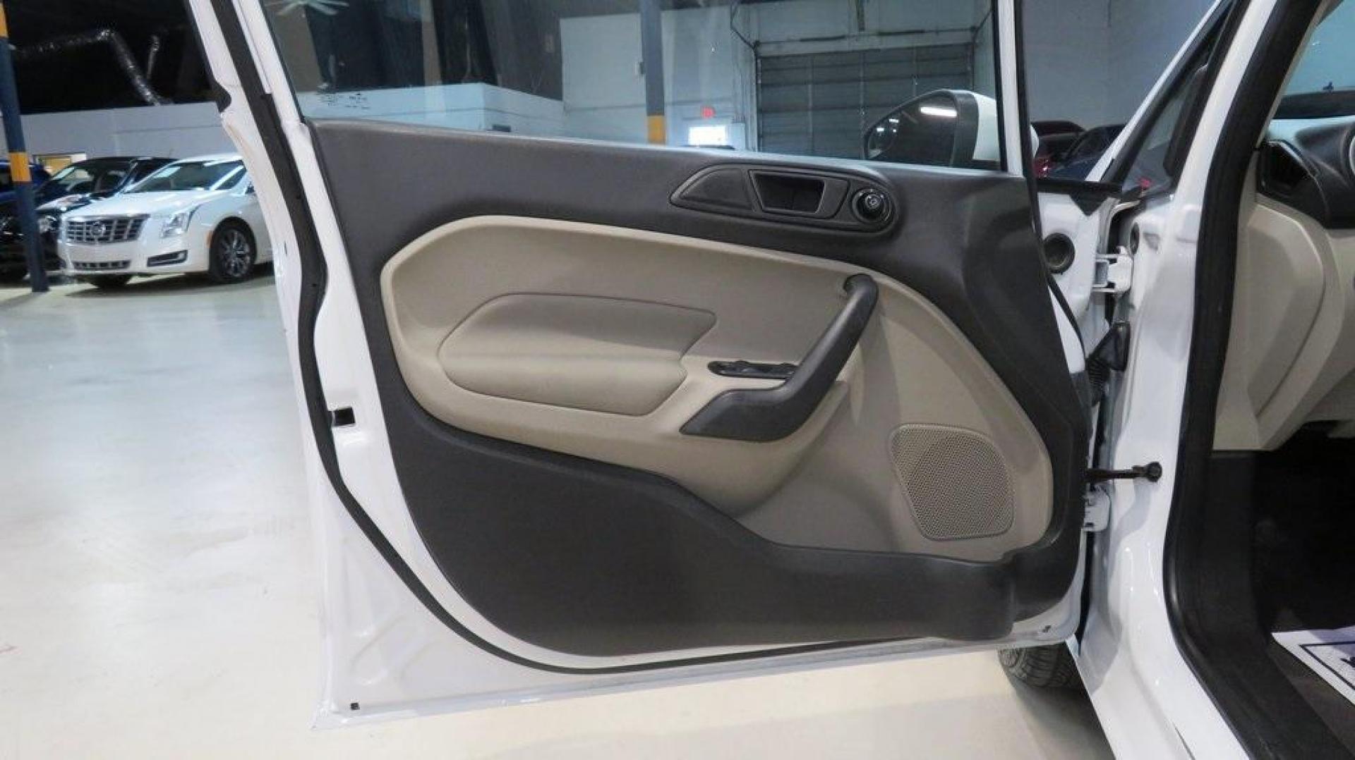 2018 Oxford White /Medium Light Stone Ford Fiesta SE (3FADP4EJ6JM) with an 1.6L I4 Ti-VCT engine, Automatic transmission, located at 15300 Midway Rd., Addison, TX, 75001, (972) 702-0011, 32.958321, -96.838074 - 2018 Ford Fiesta SE Hatchback<br>Now Available at Midway Auto Group Addison, Texas<br><br>Compact, stylish, and packed with value, the 2018 Ford Fiesta SE Hatchback is a fun-to-drive car that offers smart tech, impressive fuel economy, and hatchback versatility. Whether you're commuting through Add - Photo#24
