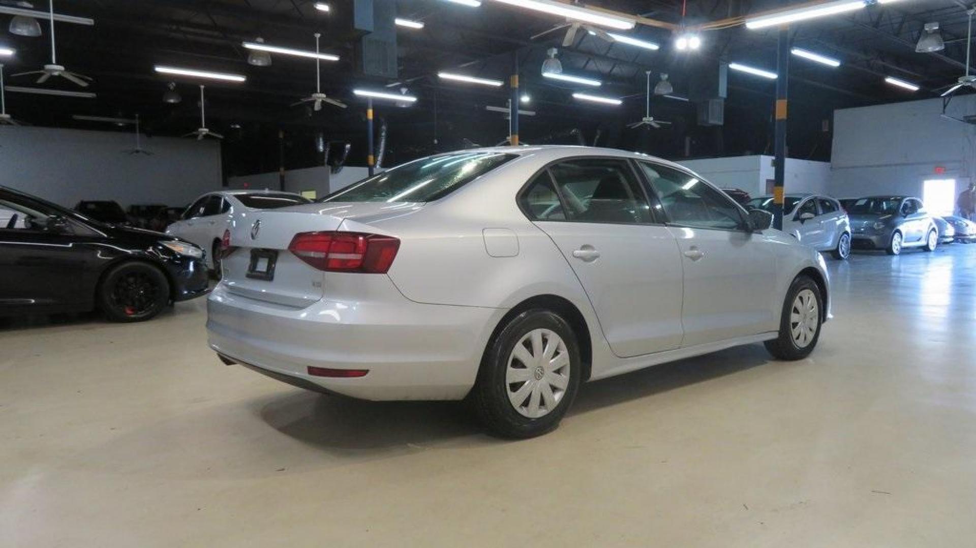 2016 Reflex Silver Metallic /Black Volkswagen Jetta 1.4T S (3VW267AJ1GM) with an I4 engine, Automatic transmission, located at 15300 Midway Rd., Addison, TX, 75001, (972) 702-0011, 32.958321, -96.838074 - Photo#2