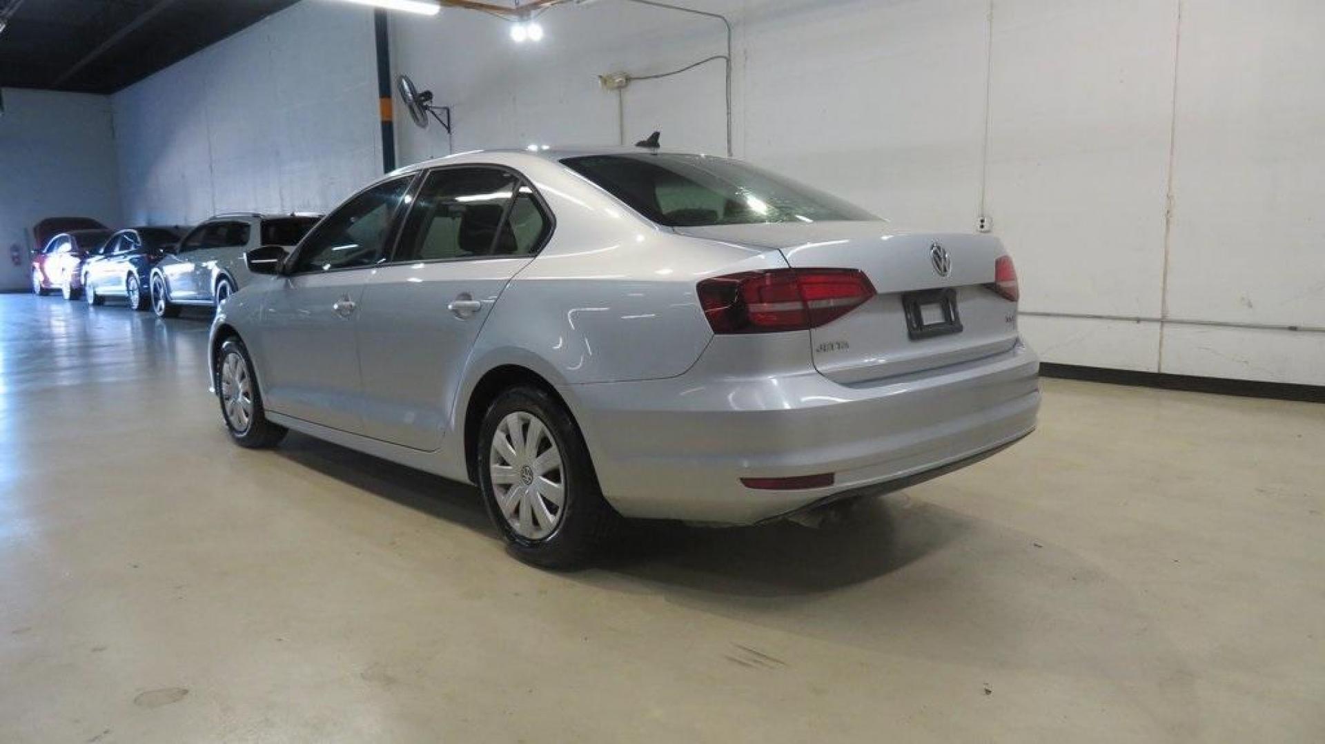 2016 Reflex Silver Metallic /Black Volkswagen Jetta 1.4T S (3VW267AJ1GM) with an I4 engine, Automatic transmission, located at 15300 Midway Rd., Addison, TX, 75001, (972) 702-0011, 32.958321, -96.838074 - Photo#4