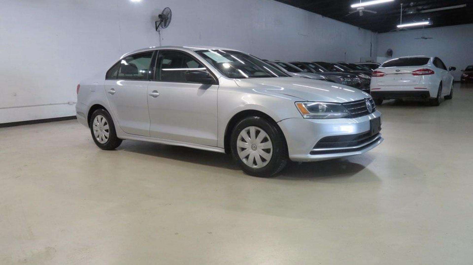 2016 Reflex Silver Metallic /Black Volkswagen Jetta 1.4T S (3VW267AJ1GM) with an I4 engine, Automatic transmission, located at 15300 Midway Rd., Addison, TX, 75001, (972) 702-0011, 32.958321, -96.838074 - Photo#7