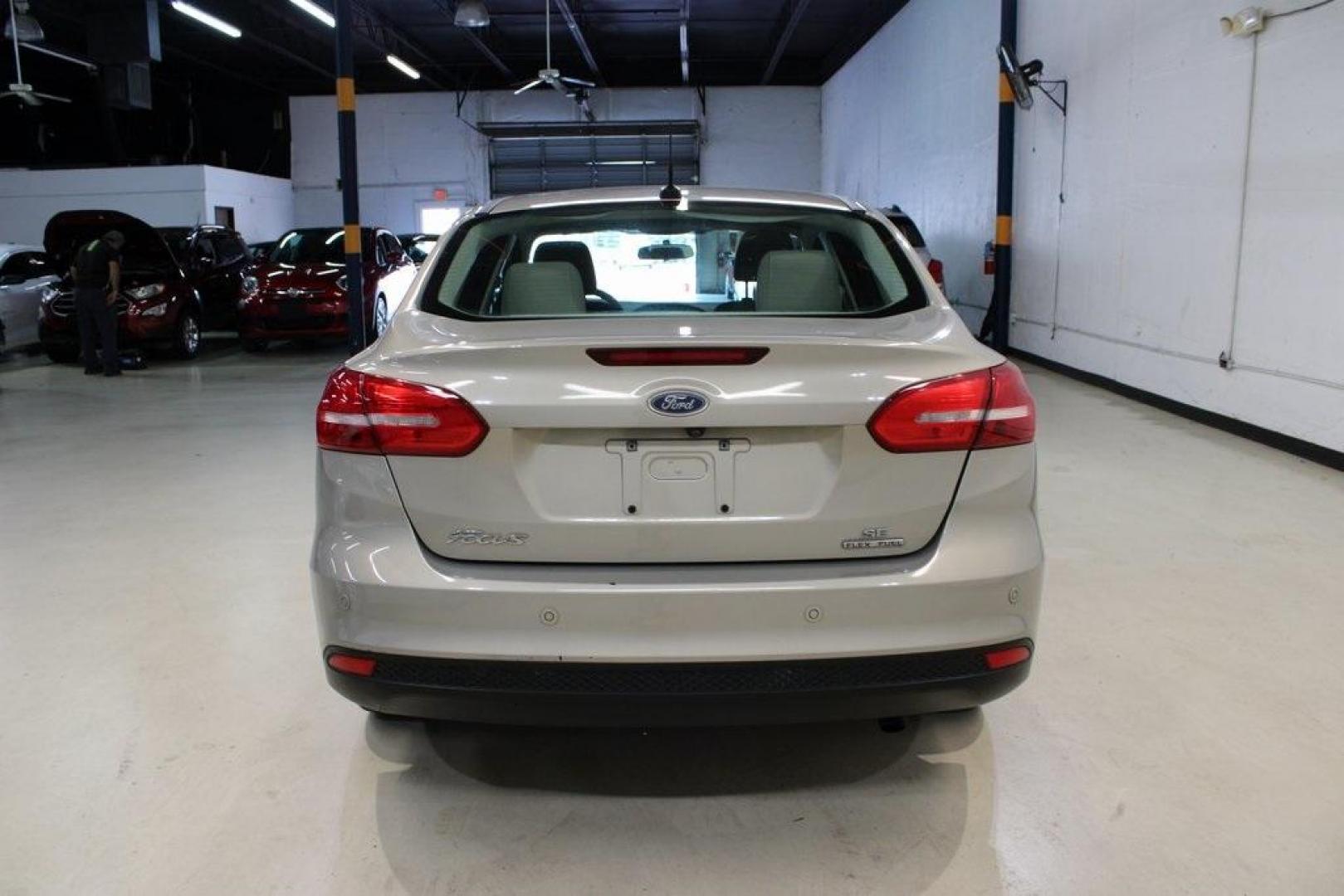 2015 Tectonic /Medium Light Stone Ford Focus SE (1FADP3F29FL) with an 2.0L 4-Cylinder DGI Flex Fuel DOHC engine, Automatic transmission, located at 15300 Midway Rd., Addison, TX, 75001, (972) 702-0011, 32.958321, -96.838074 - 2015 Ford Focus SE<br>Now Available at Midway Auto Group Addison, Texas<br><br>Efficient, comfortable, and packed with useful tech, the 2015 Ford Focus SE is the ideal compact sedan for daily driving around Addison or longer commutes across Texas. With a sleek design and responsive handling, it off - Photo#7