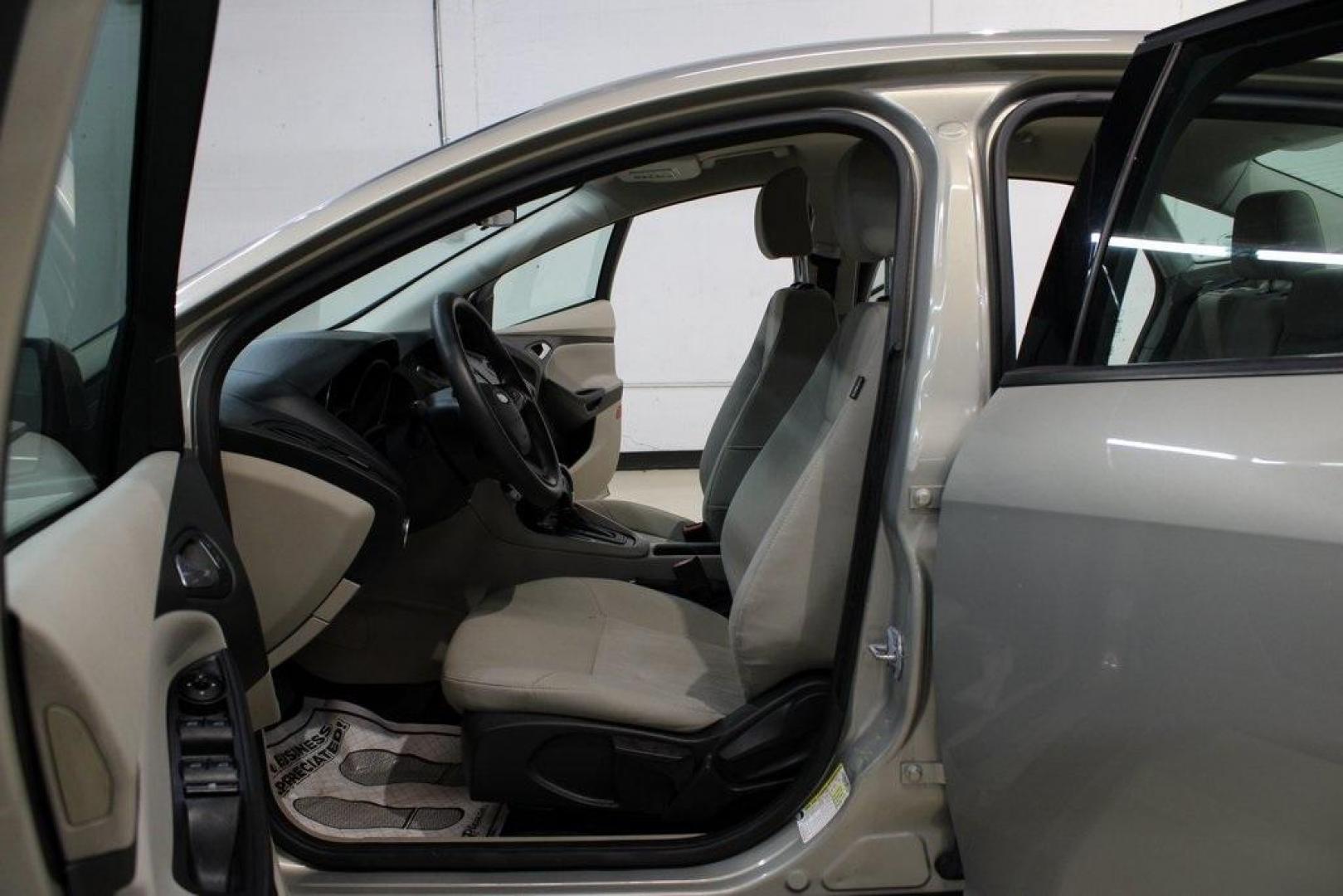 2015 Tectonic /Medium Light Stone Ford Focus SE (1FADP3F29FL) with an 2.0L 4-Cylinder DGI Flex Fuel DOHC engine, Automatic transmission, located at 15300 Midway Rd., Addison, TX, 75001, (972) 702-0011, 32.958321, -96.838074 - 2015 Ford Focus SE<br>Now Available at Midway Auto Group Addison, Texas<br><br>Efficient, comfortable, and packed with useful tech, the 2015 Ford Focus SE is the ideal compact sedan for daily driving around Addison or longer commutes across Texas. With a sleek design and responsive handling, it off - Photo#13