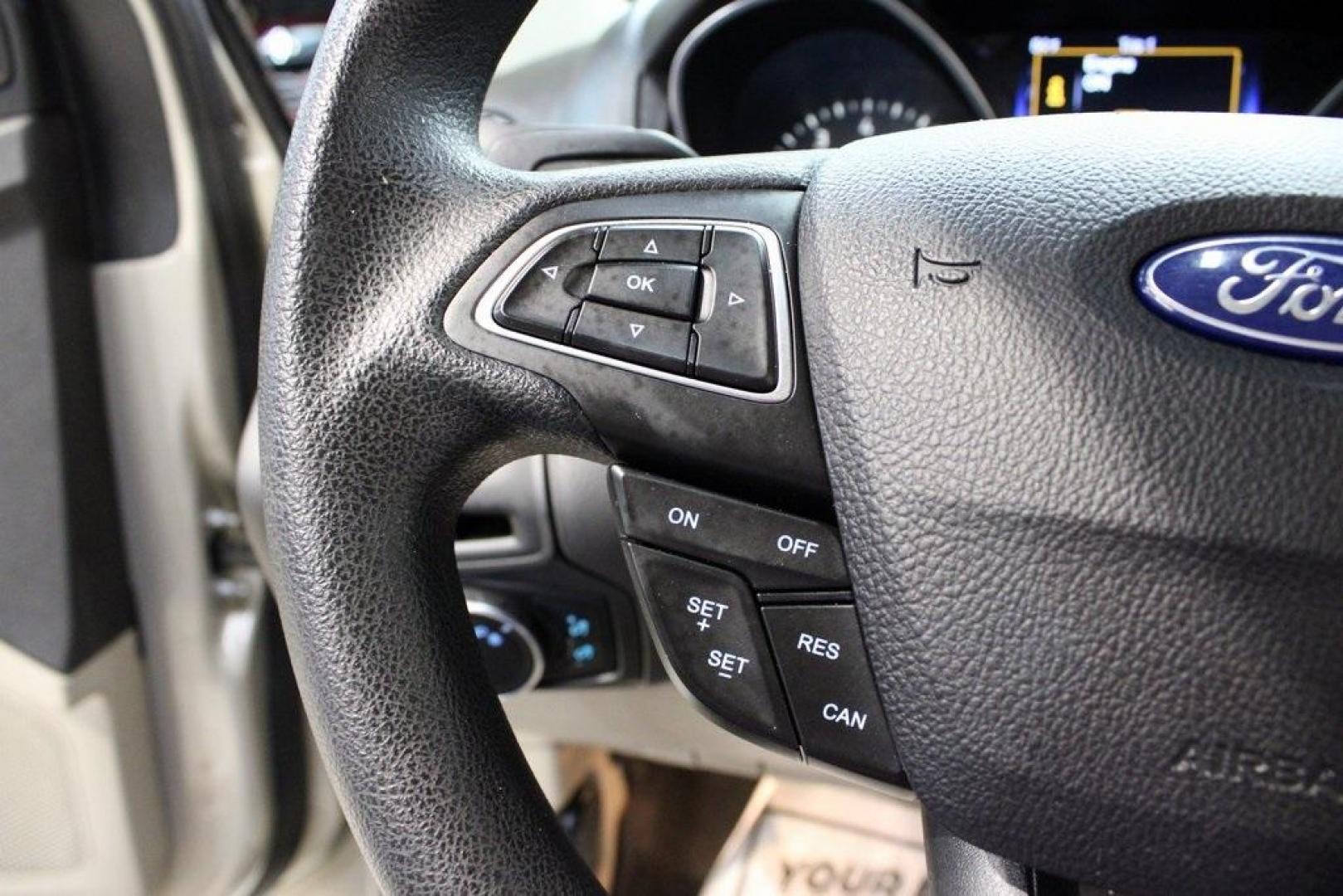2015 Tectonic /Medium Light Stone Ford Focus SE (1FADP3F29FL) with an 2.0L 4-Cylinder DGI Flex Fuel DOHC engine, Automatic transmission, located at 15300 Midway Rd., Addison, TX, 75001, (972) 702-0011, 32.958321, -96.838074 - 2015 Ford Focus SE<br>Now Available at Midway Auto Group Addison, Texas<br><br>Efficient, comfortable, and packed with useful tech, the 2015 Ford Focus SE is the ideal compact sedan for daily driving around Addison or longer commutes across Texas. With a sleek design and responsive handling, it off - Photo#24
